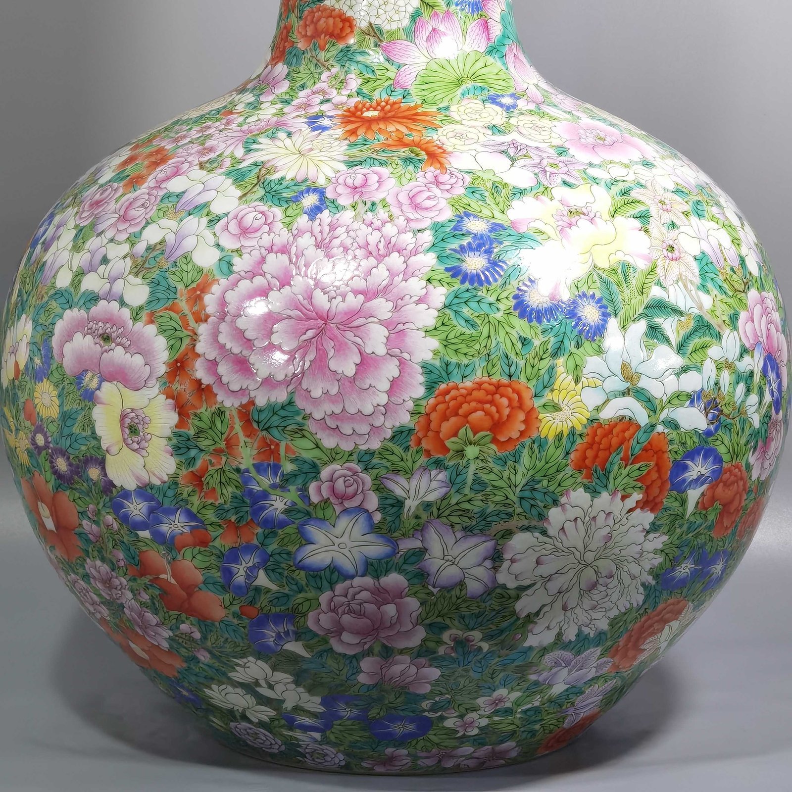 Qing Dynasty Qianlong a pastel colored sky vase with hundreds of flowers