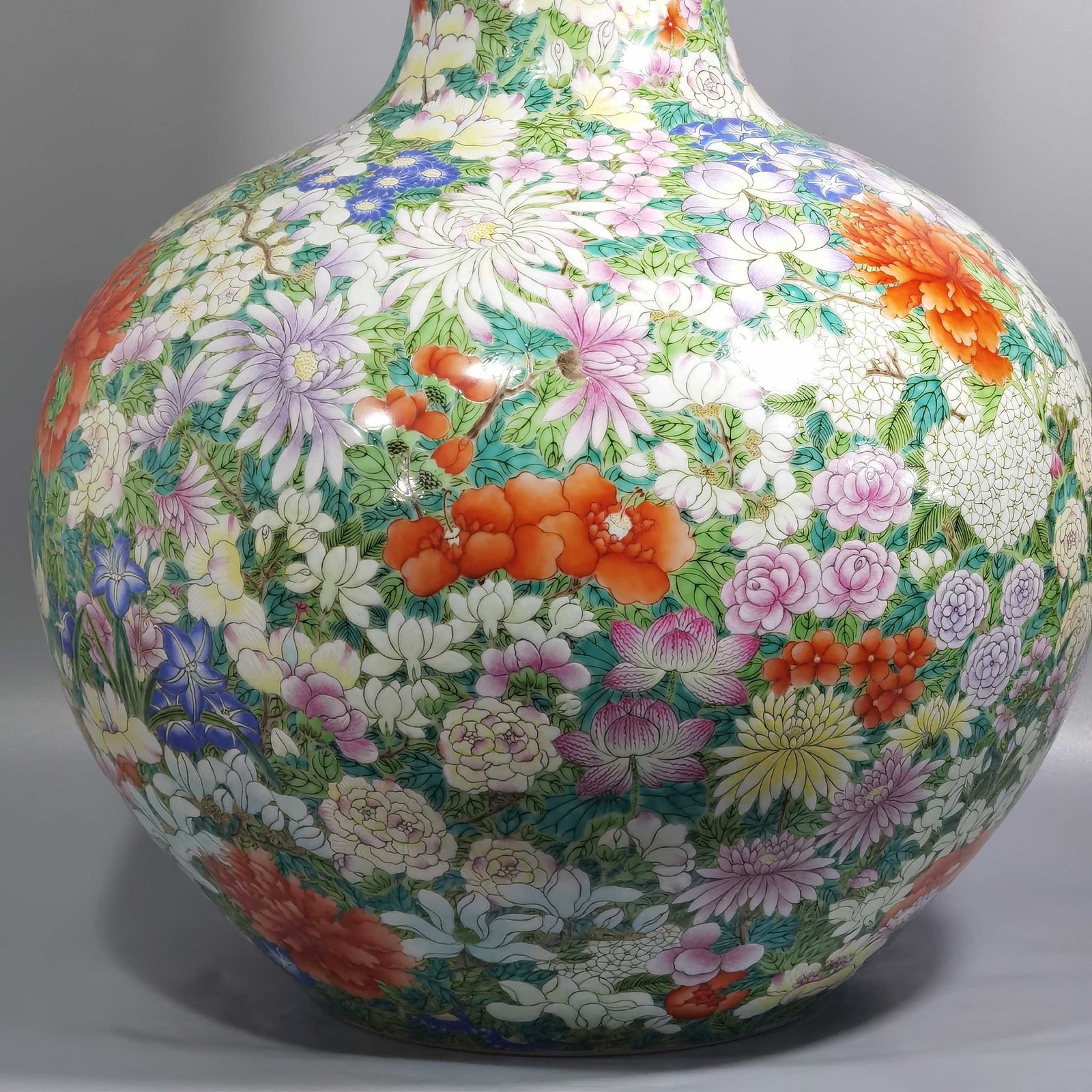 Qing Dynasty Qianlong a pastel colored sky vase with hundreds of flowers