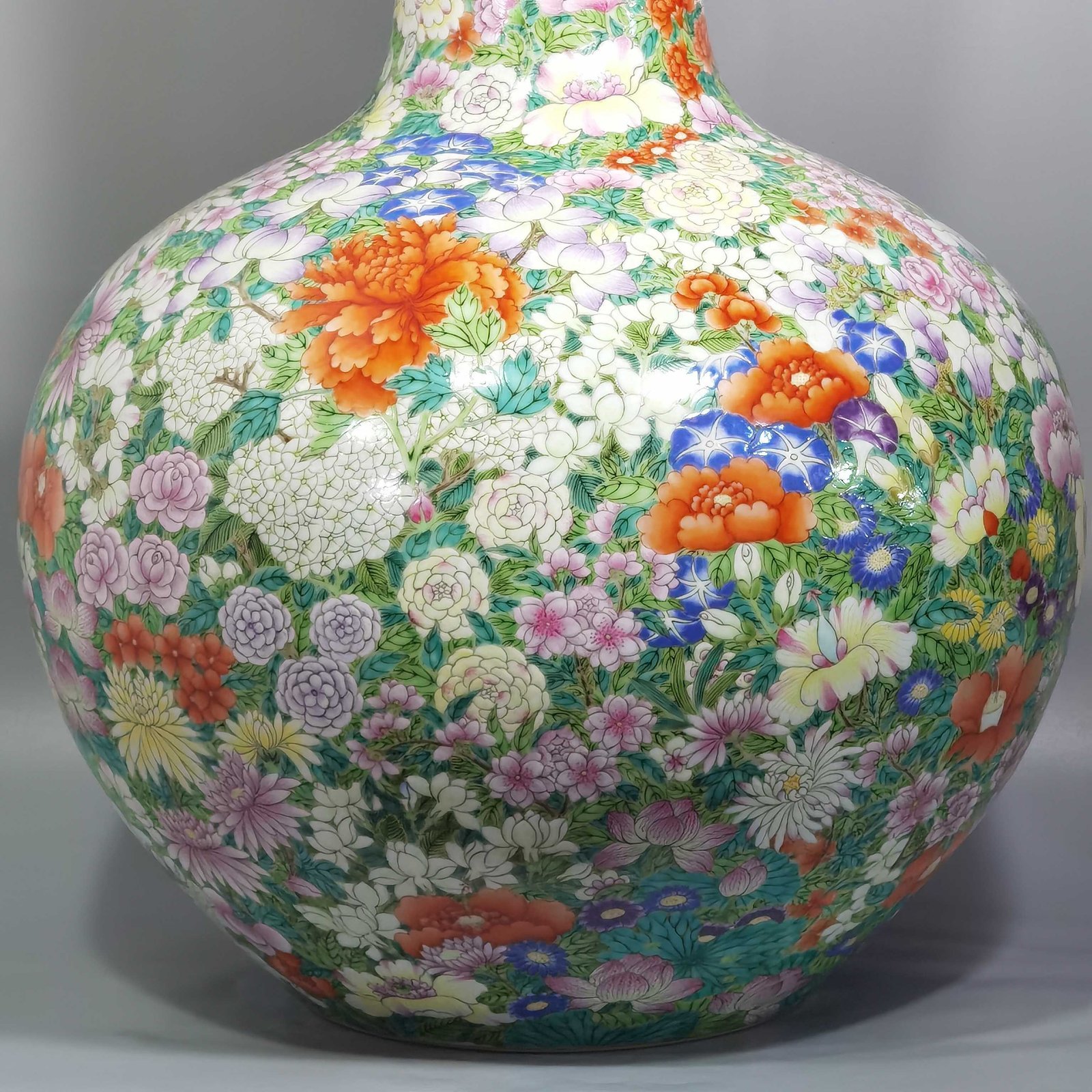 Qing Dynasty Qianlong a pastel colored sky vase with hundreds of flowers