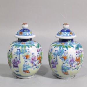 Qing Dynasty Qianlong blue and white colored baby playing picture covered jar