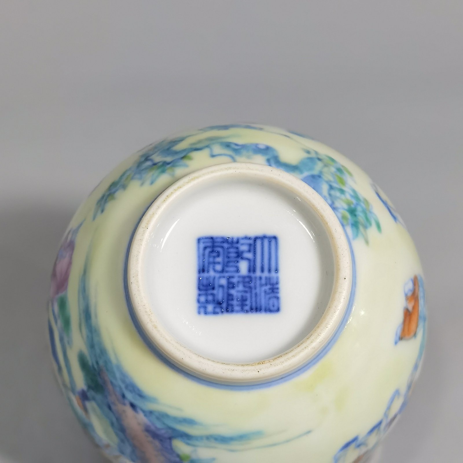 Qing Dynasty Qianlong blue and white colored baby playing picture covered jar
