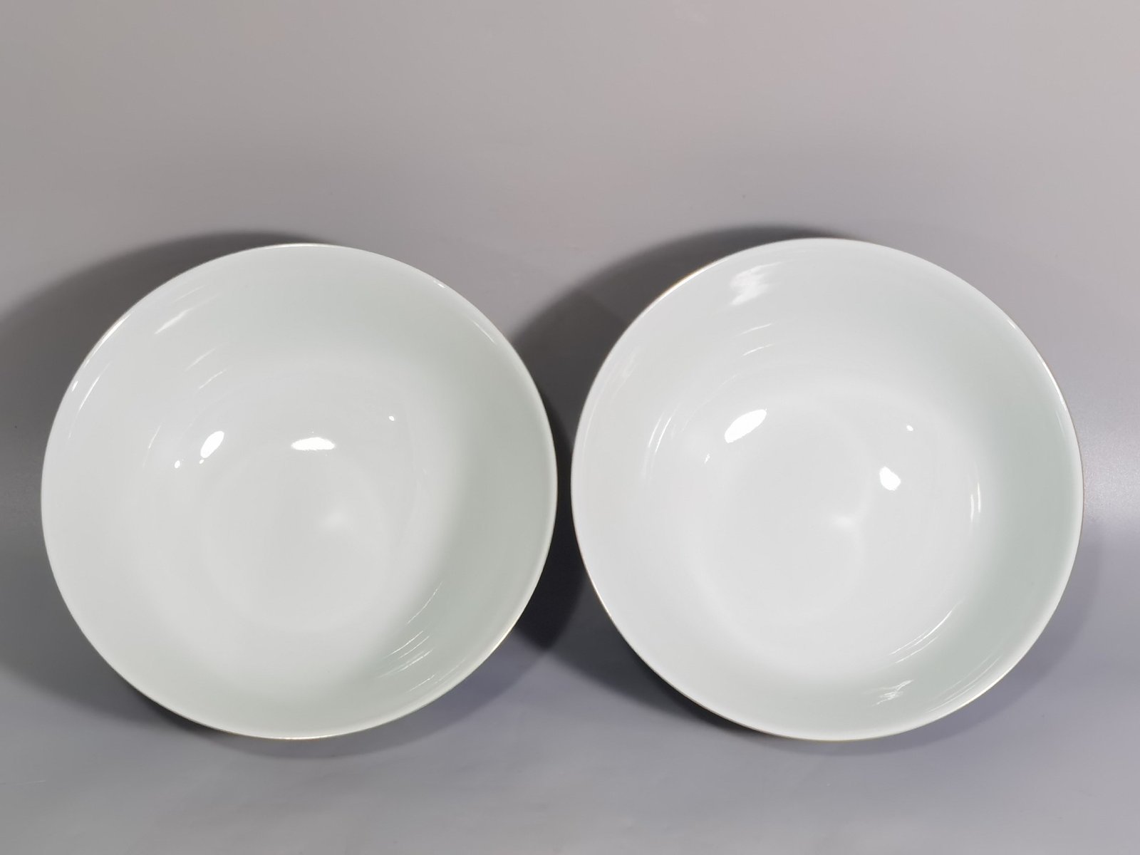 Qing Dynasty Qianlong blue and white longevity and longevity branches windowed pastel flower pattern bowl