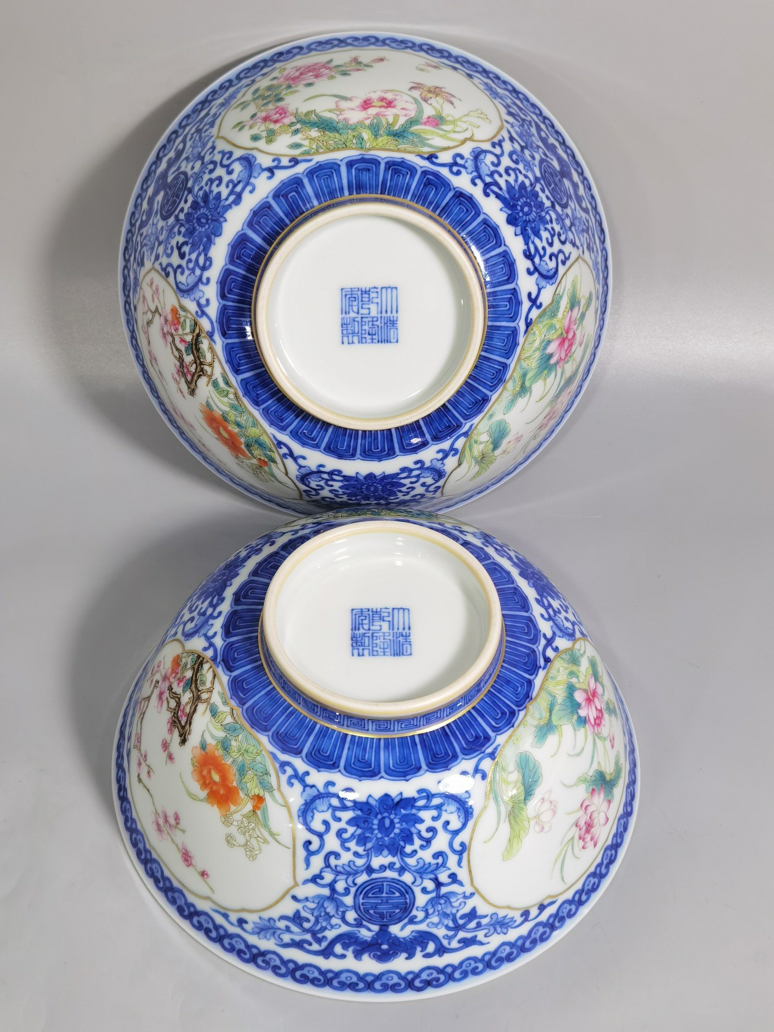 Qing Dynasty Qianlong blue and white longevity and longevity branches windowed pastel flower pattern bowl