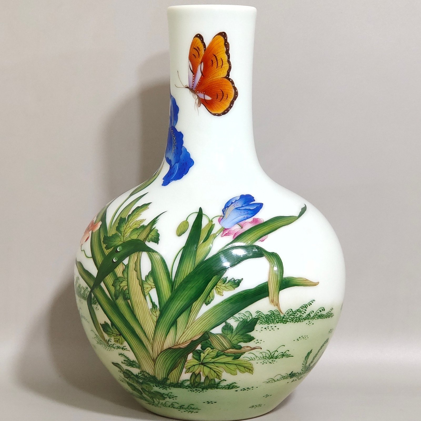Qing Dynasty Qianlong enamel Lang Shining orchid poem celestial vase