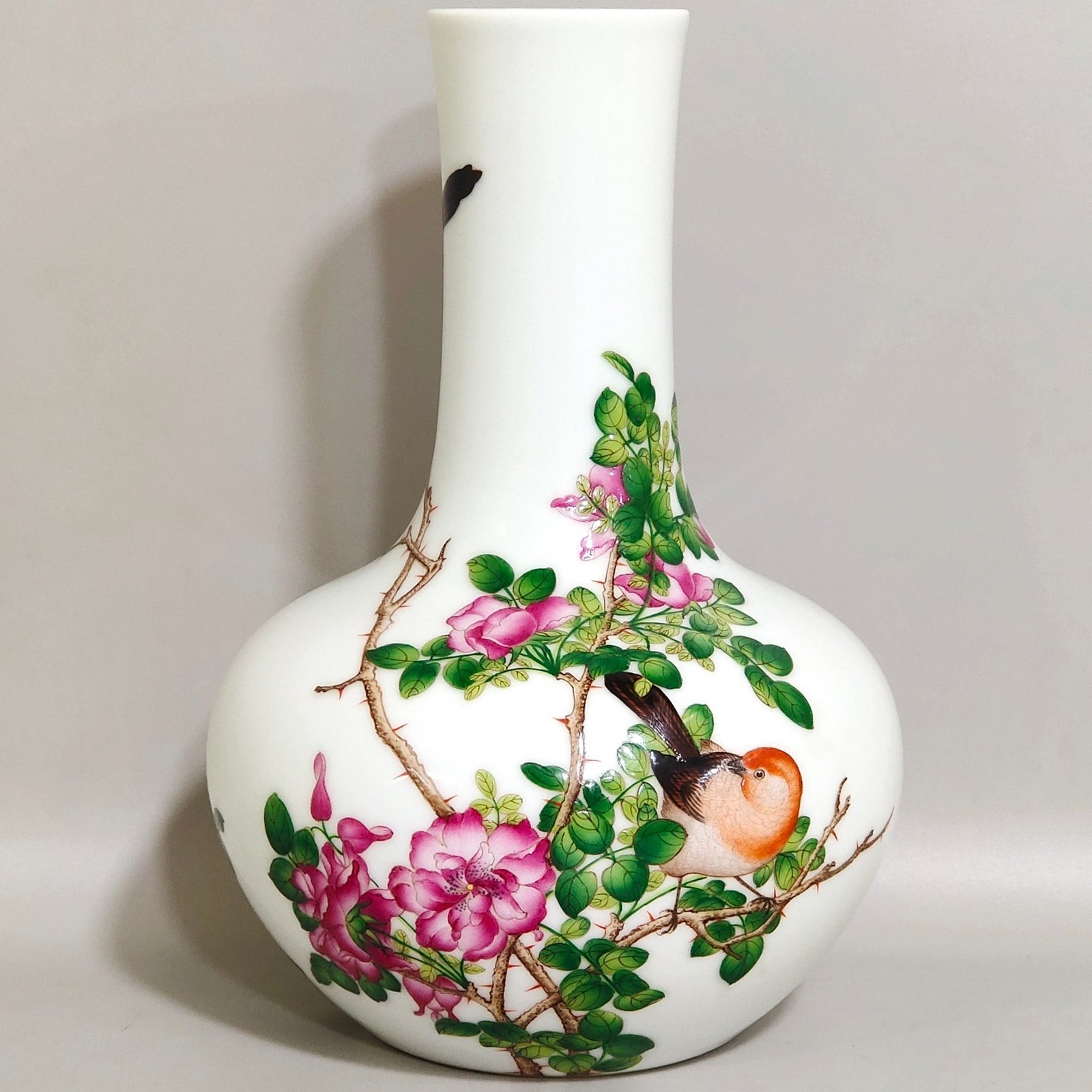 Qing Dynasty Qianlong enamel Lang Shining flower and bird poem celestial vase