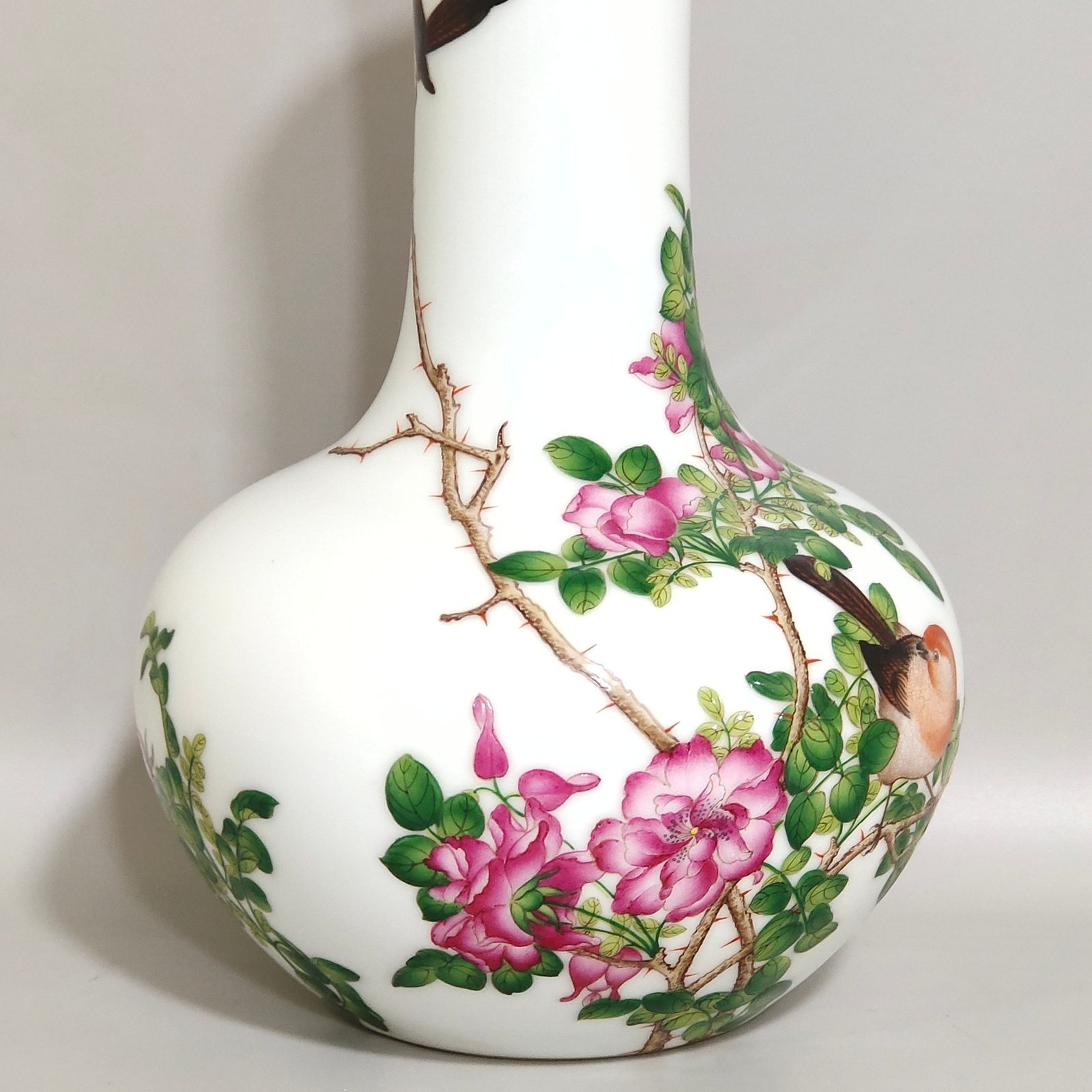 Qing Dynasty Qianlong enamel Lang Shining flower and bird poem celestial vase