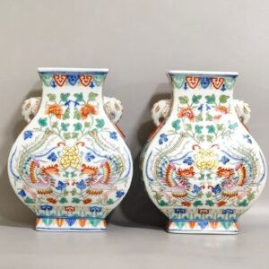 Qing Dynasty Qianlong blue-and-white and polychrome square vase with elephant-head handles