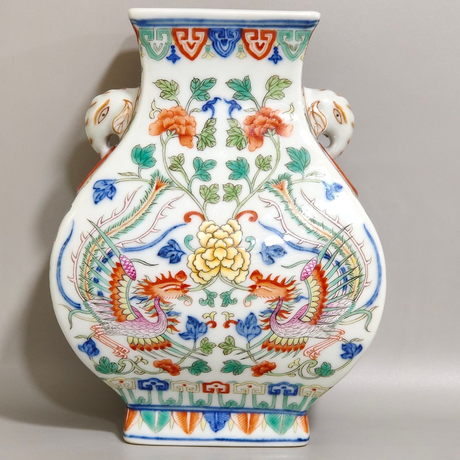 Qing Dynasty Qianlong blue-and-white and polychrome square vase with elephant-head handles