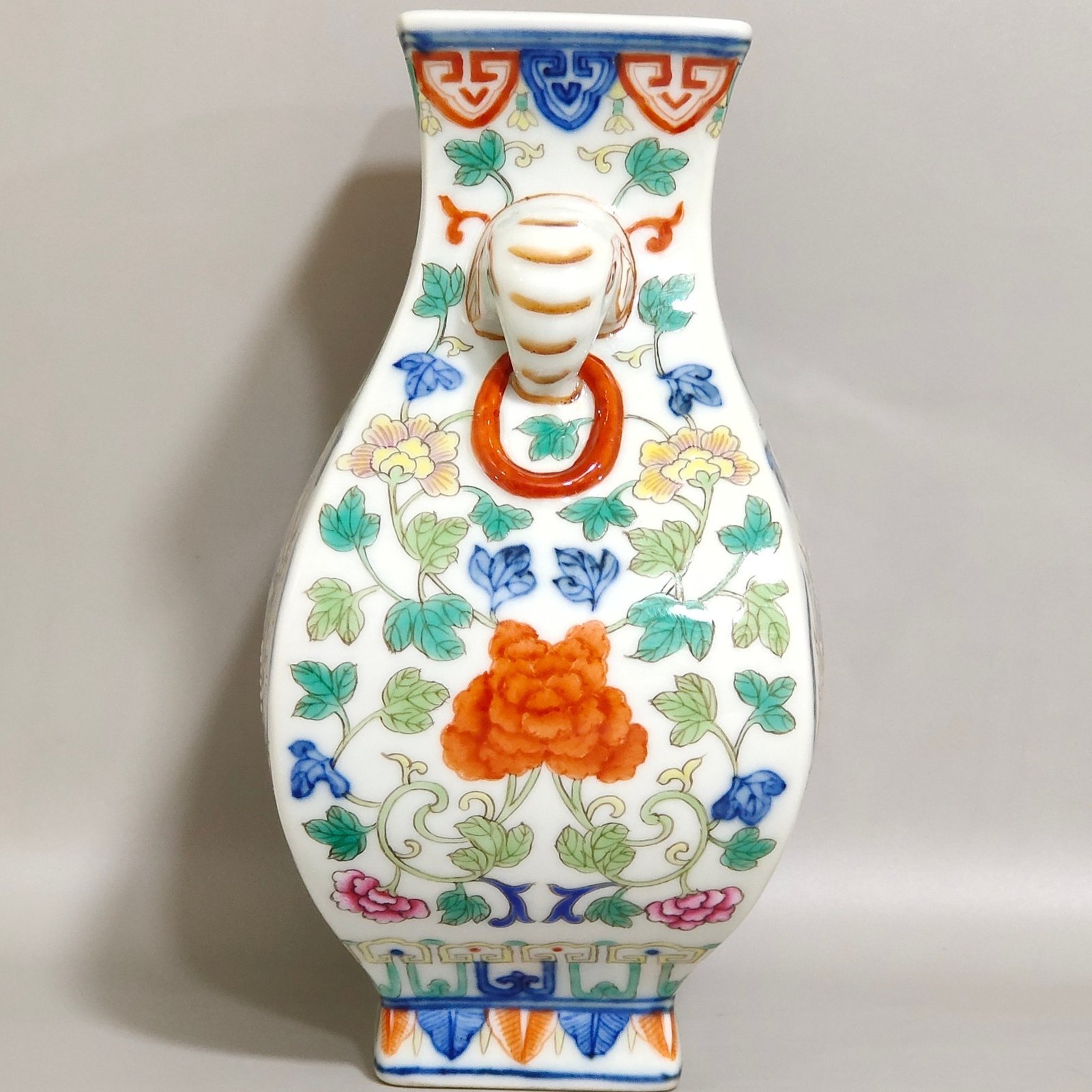 Qing Dynasty Qianlong blue-and-white and polychrome square vase with elephant-head handles