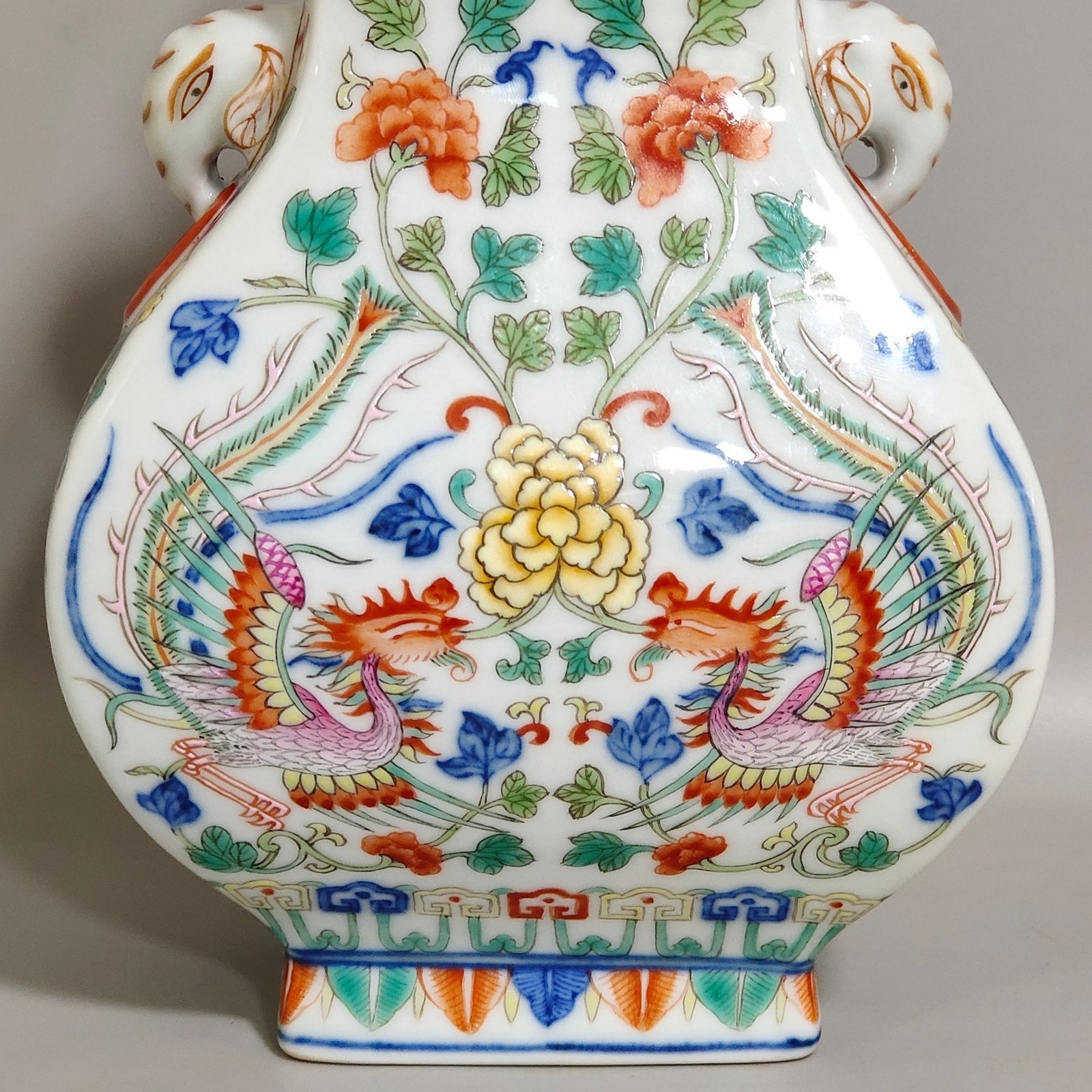 Qing Dynasty Qianlong blue-and-white and polychrome square vase with elephant-head handles