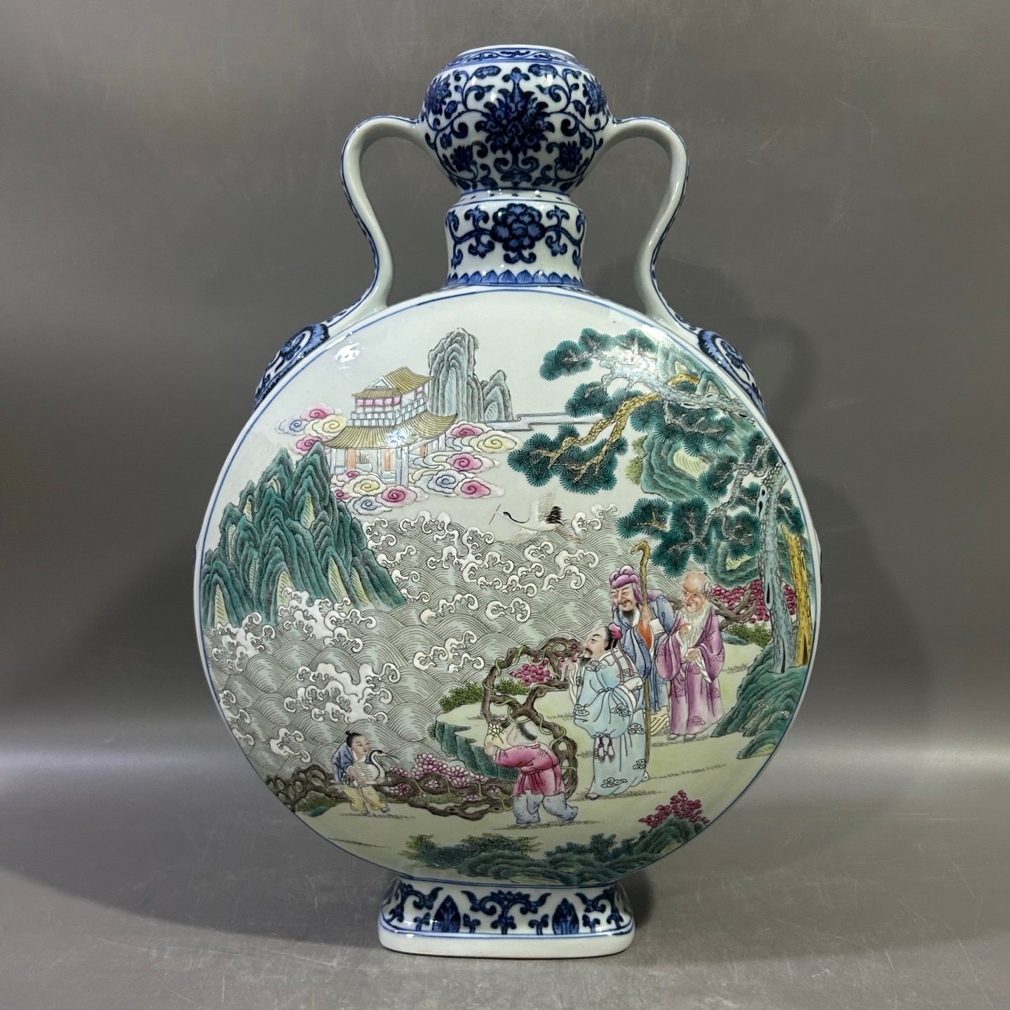 Qing Dynasty Qianlong blue and white lotus lotus pastel Eight Immortals holding the moon vase