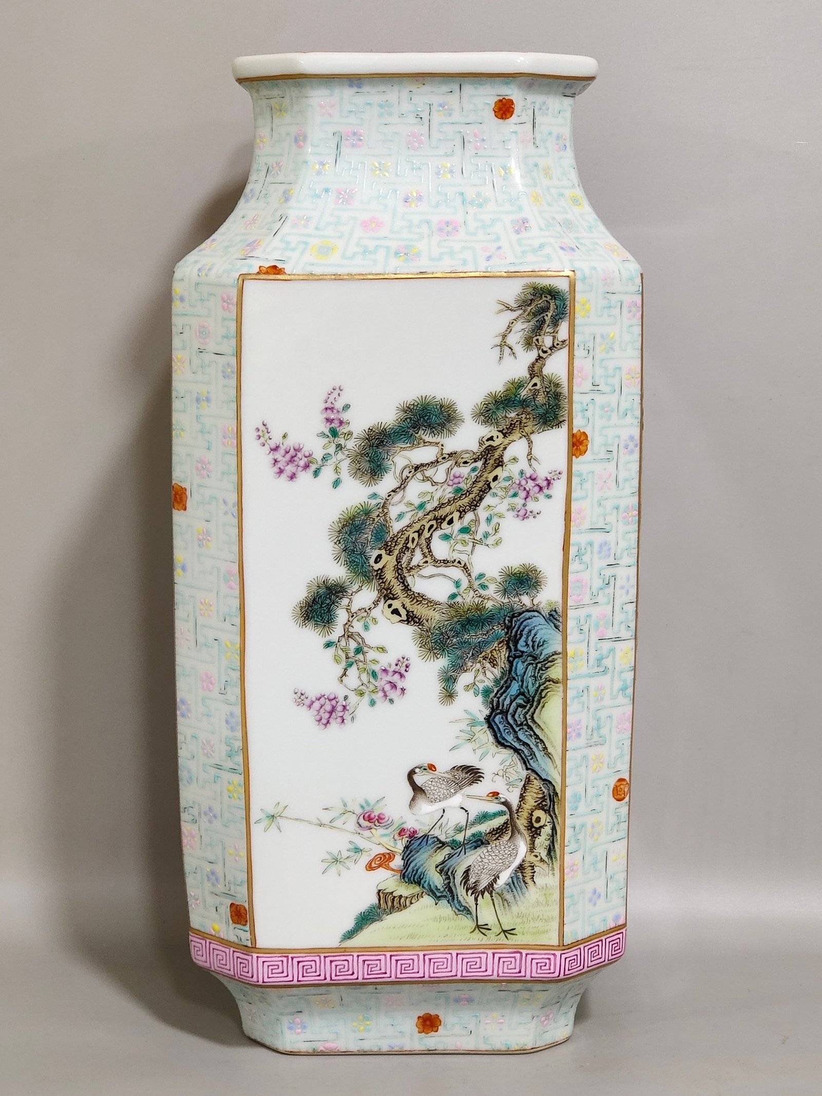 Qing Dynasty Qianlong swastika pattern octagonal vase with windows