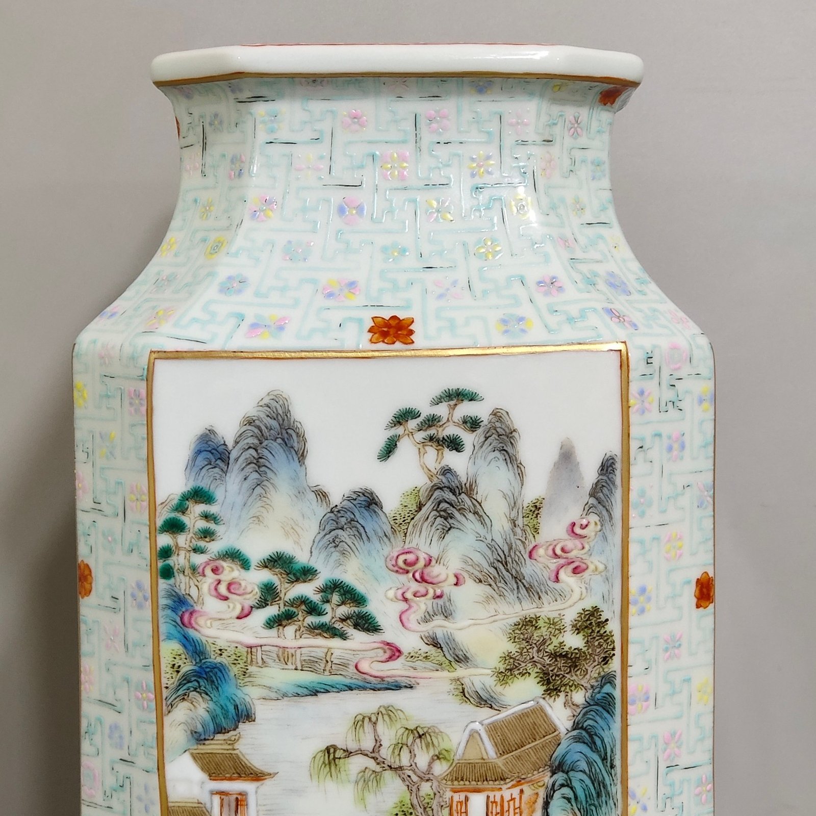 Qing Dynasty Qianlong swastika pattern octagonal vase with windows