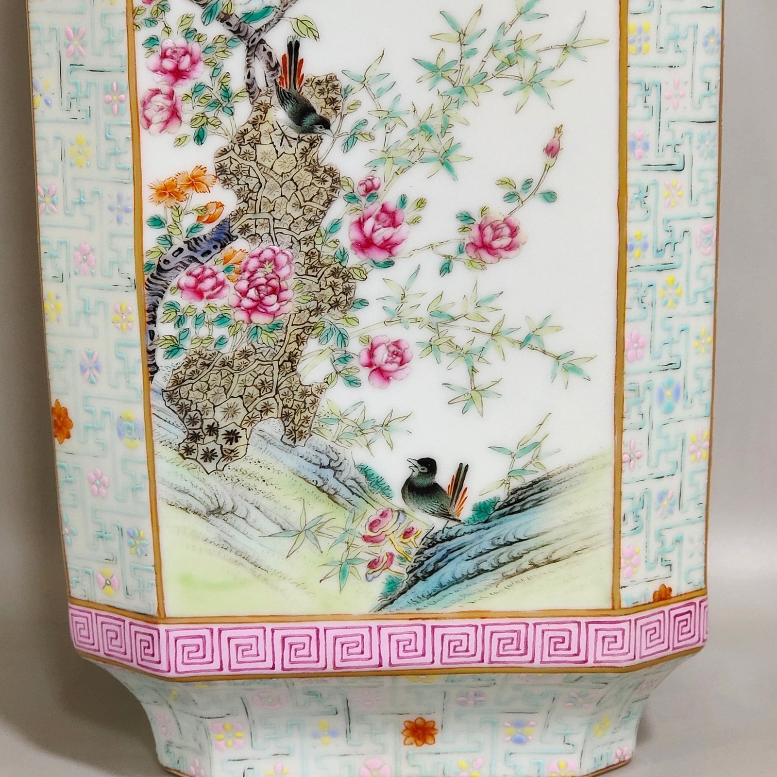 Qing Dynasty Qianlong swastika pattern octagonal vase with windows
