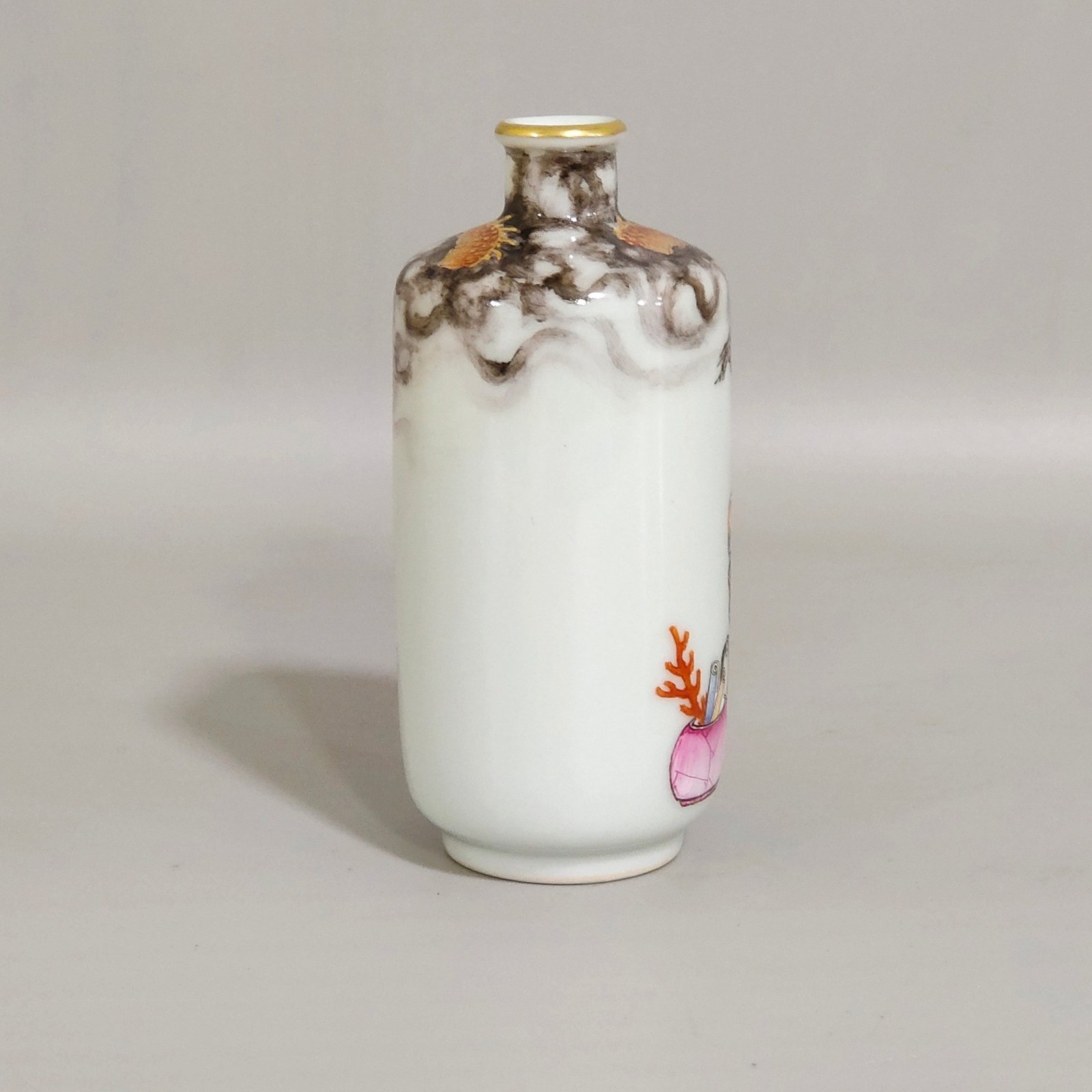 Qing Dynasty Qianlong ink color subduing dragon and Arhat snuff bottle