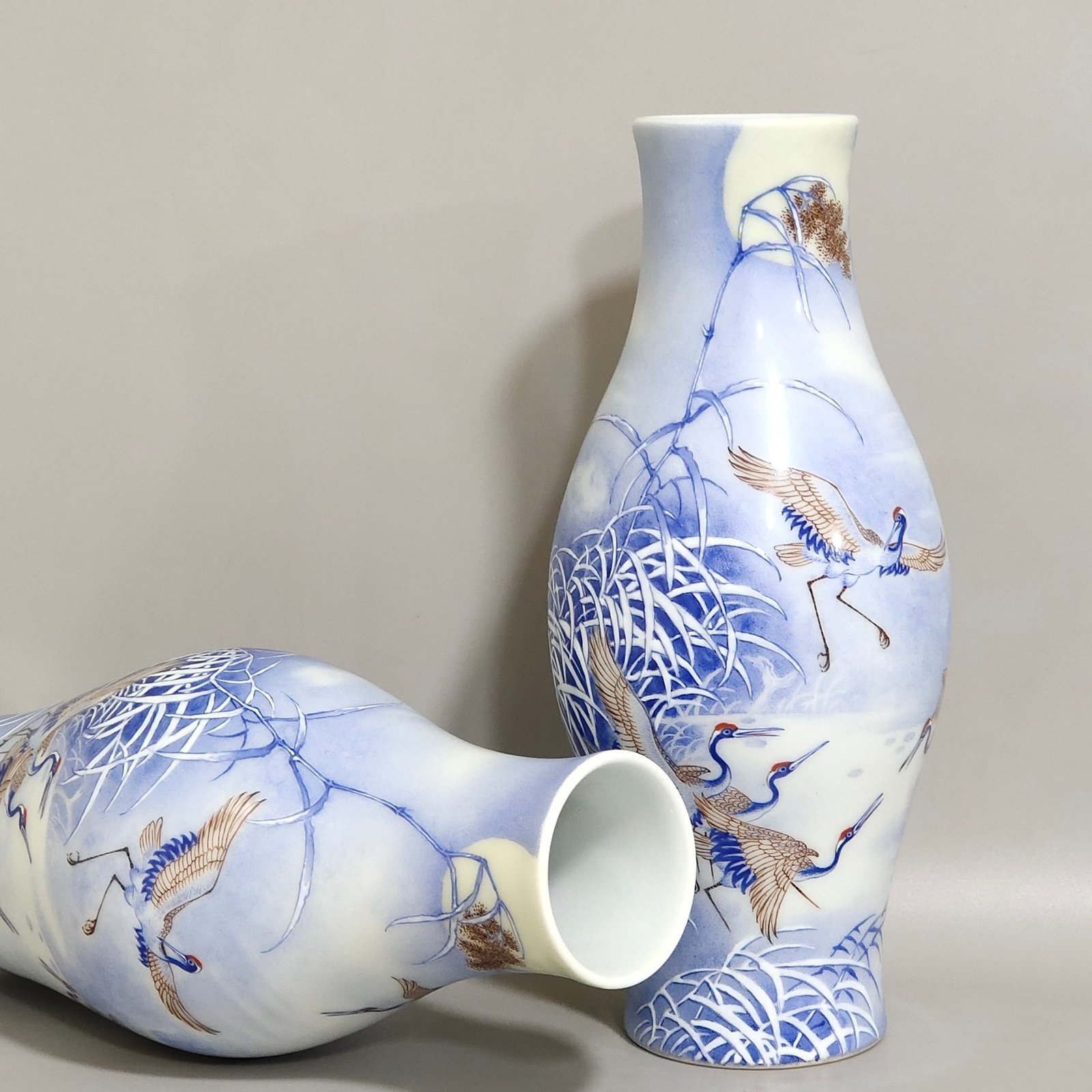 Qing Dynasty Qianlong A blue reed olive vase inscribed with a poem by a red-crowned crane