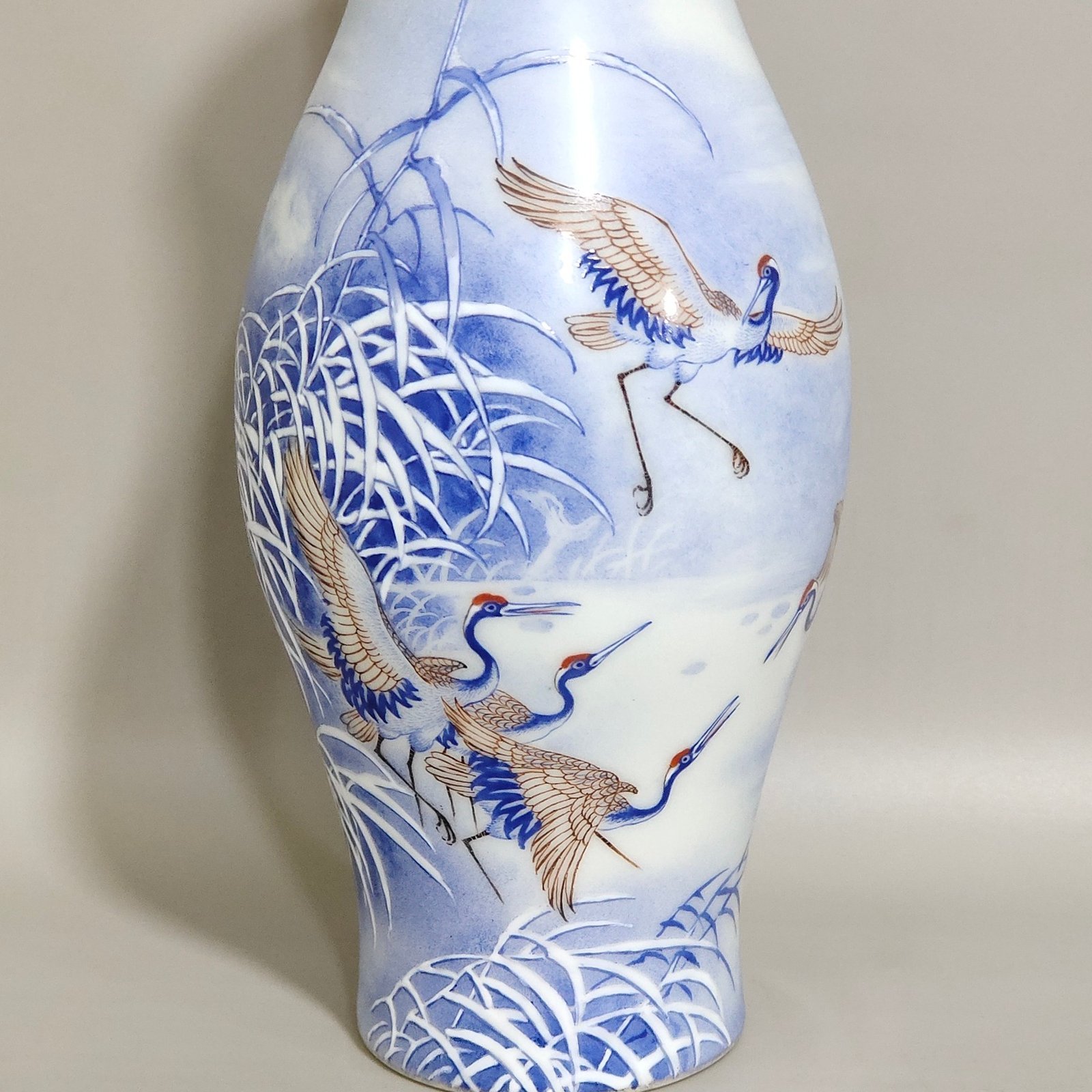 Qing Dynasty Qianlong A blue reed olive vase inscribed with a poem by a red-crowned crane