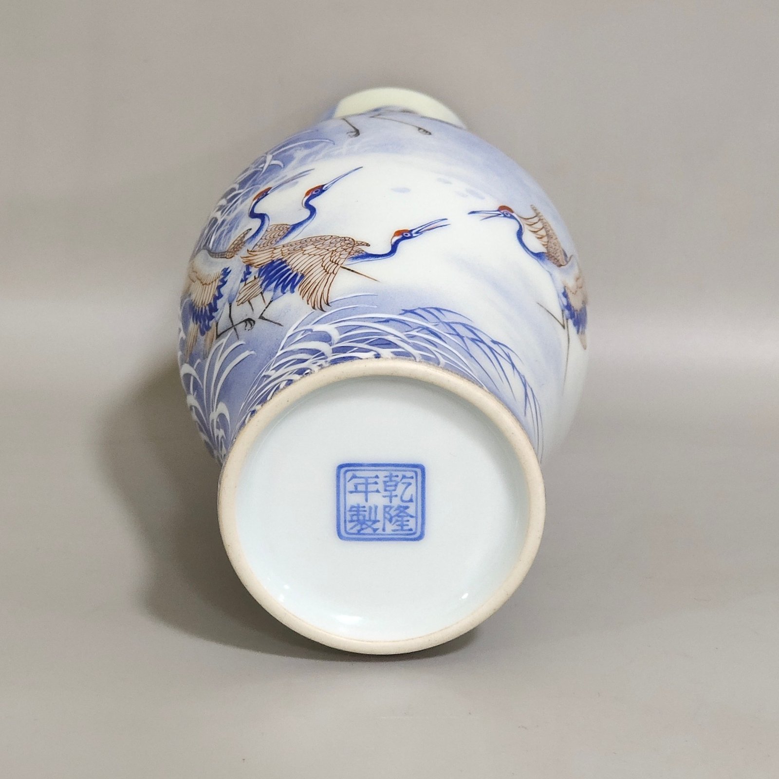 Qing Dynasty Qianlong A blue reed olive vase inscribed with a poem by a red-crowned crane