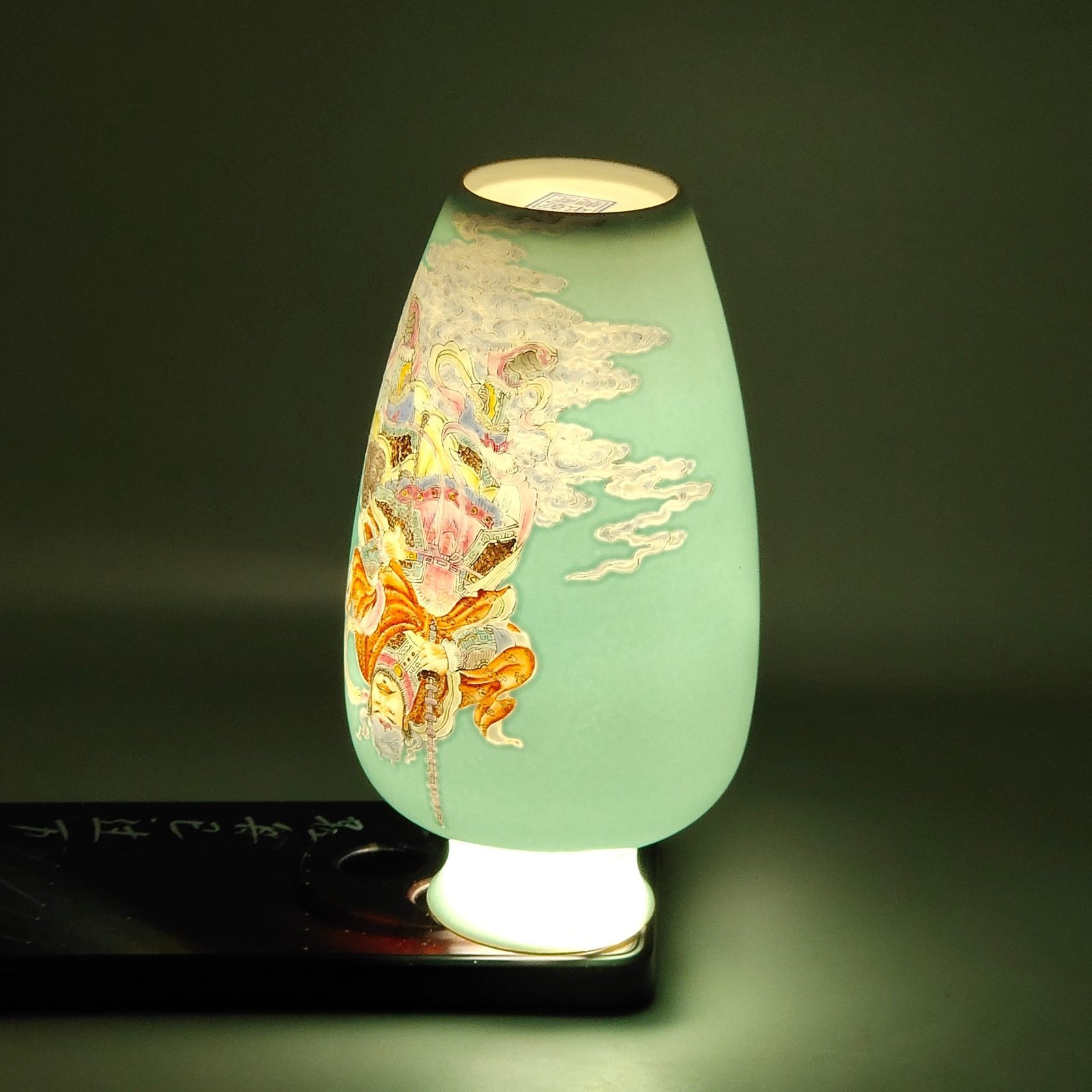 Qing Dynasty Qianlong turquoise green thin vase with characters