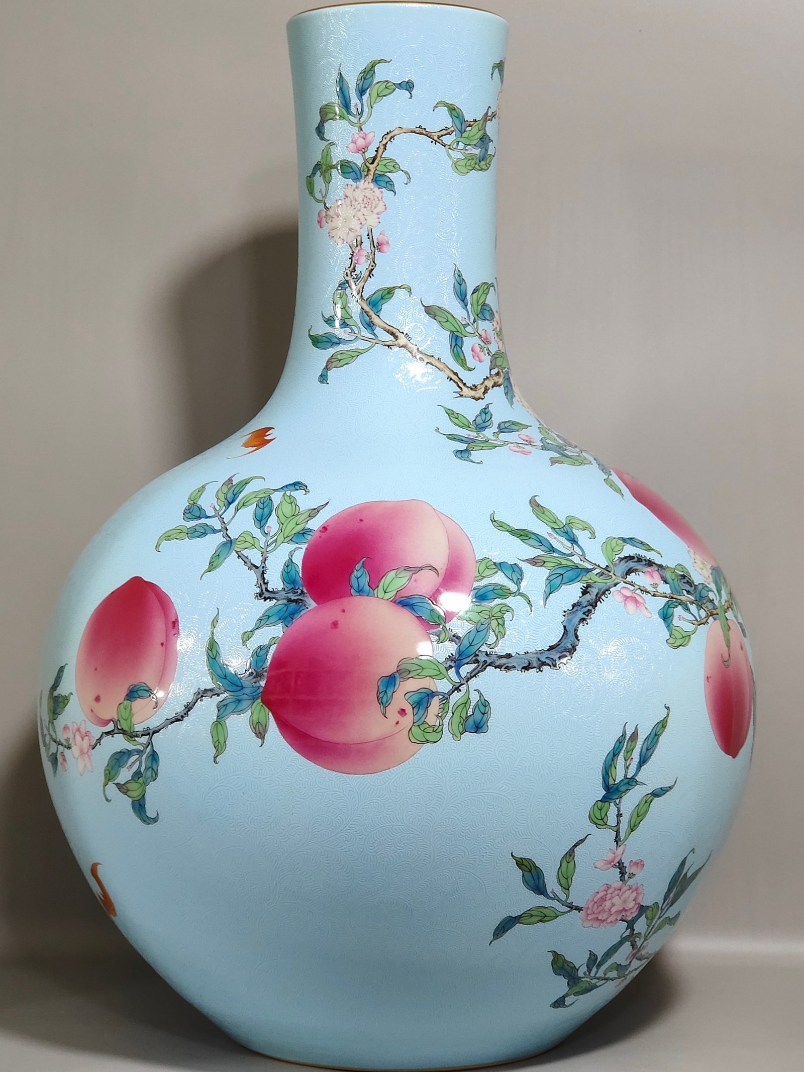 Qing Dynasty Qianlong turquoise green flowered Five Blessings and Nine Peach Celestial Ball Vase