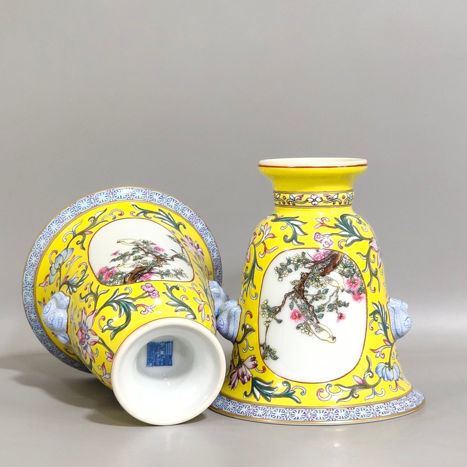 Qing Dynasty Qianlong lemon yellow window flower and bird goblet with two ears