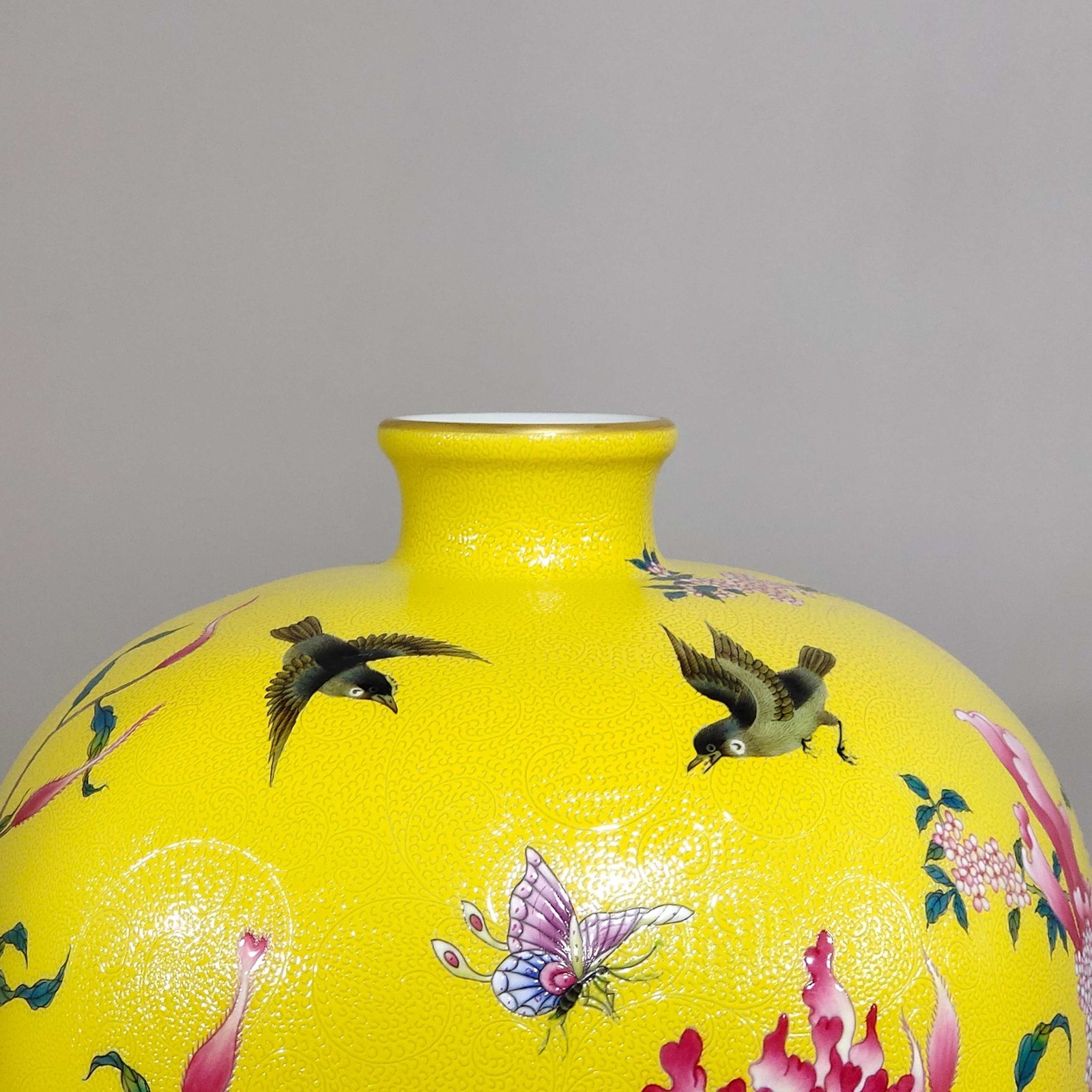 Qing Dynasty Qianlong lemon yellow glazed plum vase with cockscomb