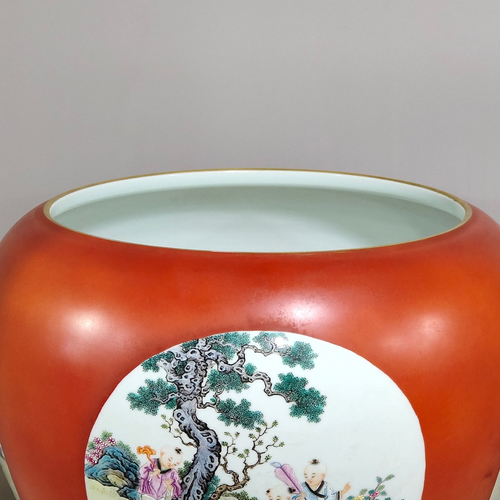 Qing Dynasty Qianlong Coral red apple vat with window showing baby playing