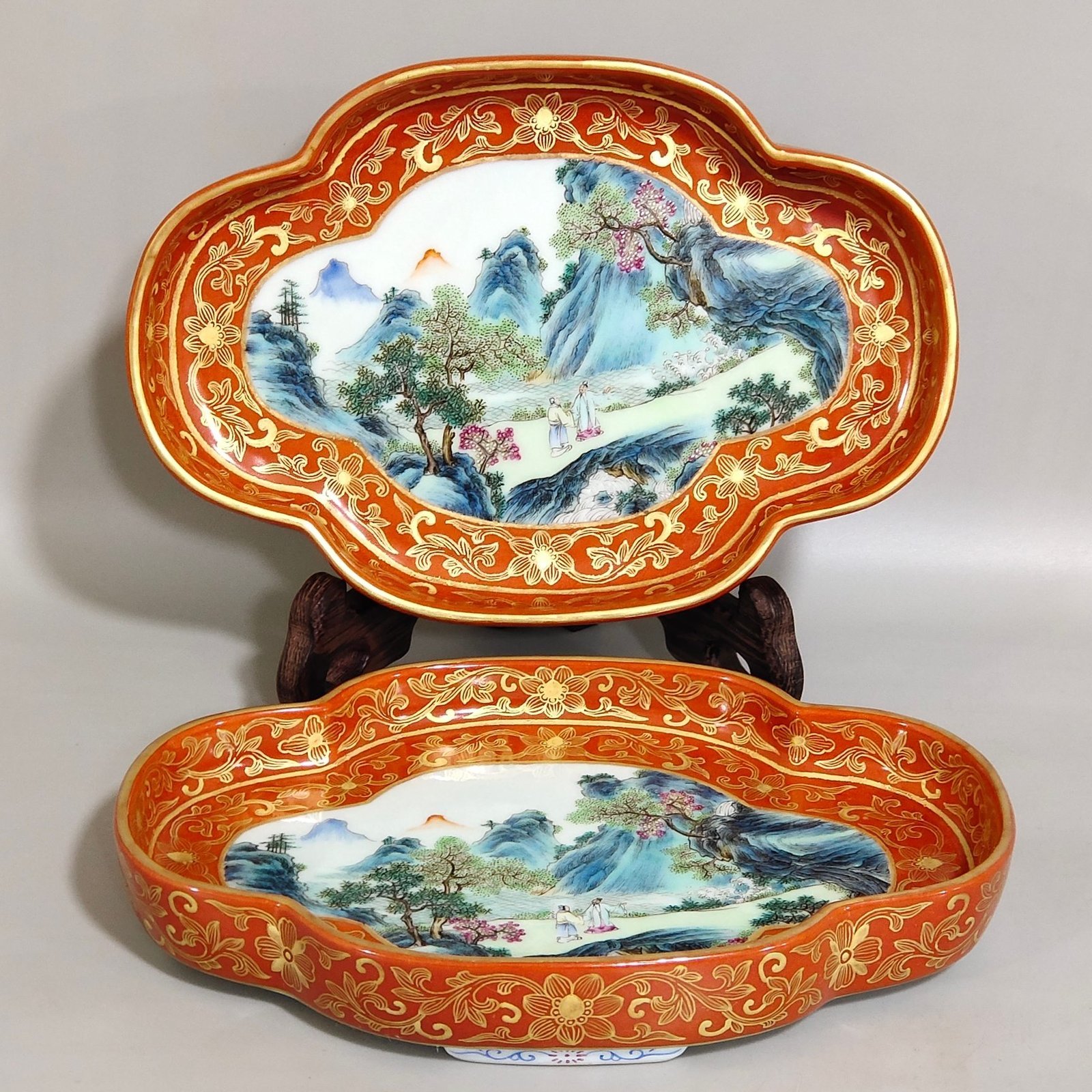 Qing Dynasty Qianlong a coral-red landscape with figures and begonia wash