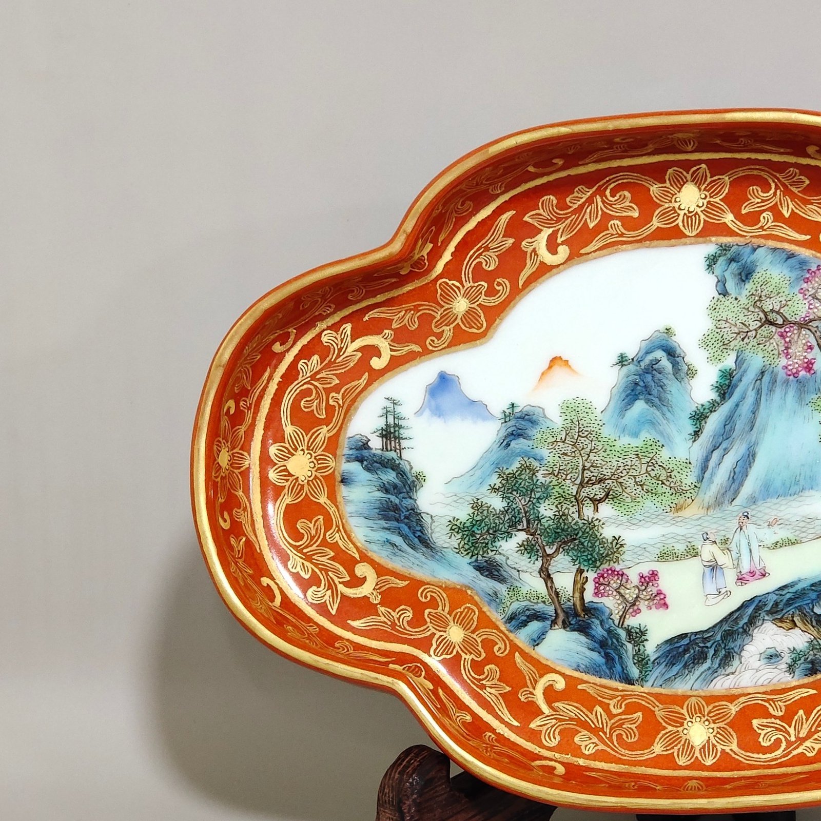Qing Dynasty Qianlong a coral-red landscape with figures and begonia wash