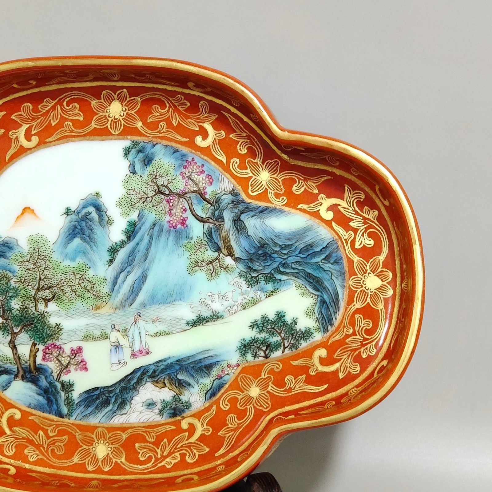 Qing Dynasty Qianlong a coral-red landscape with figures and begonia wash