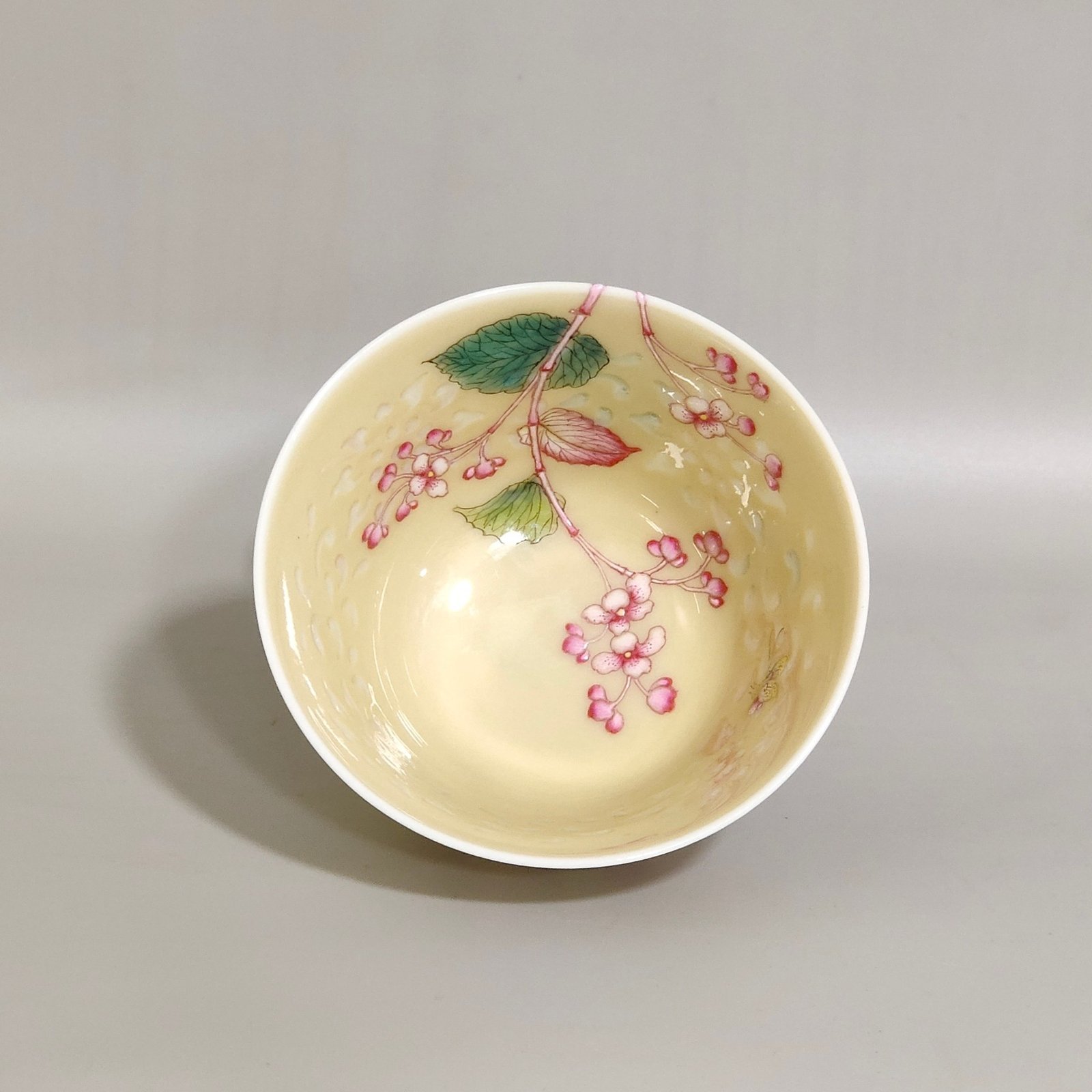 Qing Dynasty Qianlong beige glazed floral cup