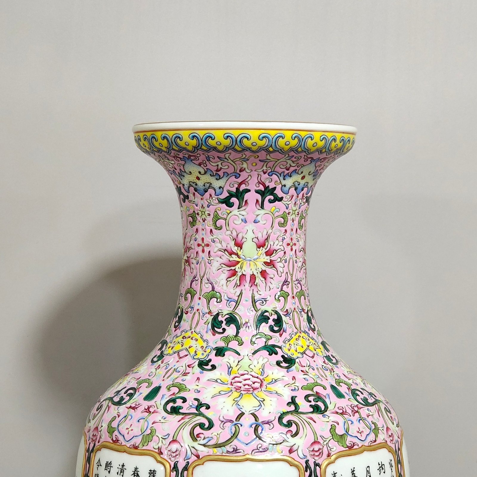 Qing Dynasty Qianlong a pink window-opened vase inscribed with flowers of the four seasons
