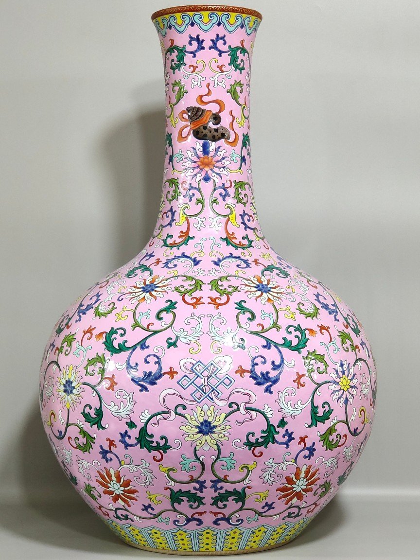 Qing Dynasty Qianlong powder ground with branches and eight treasures pattern vase