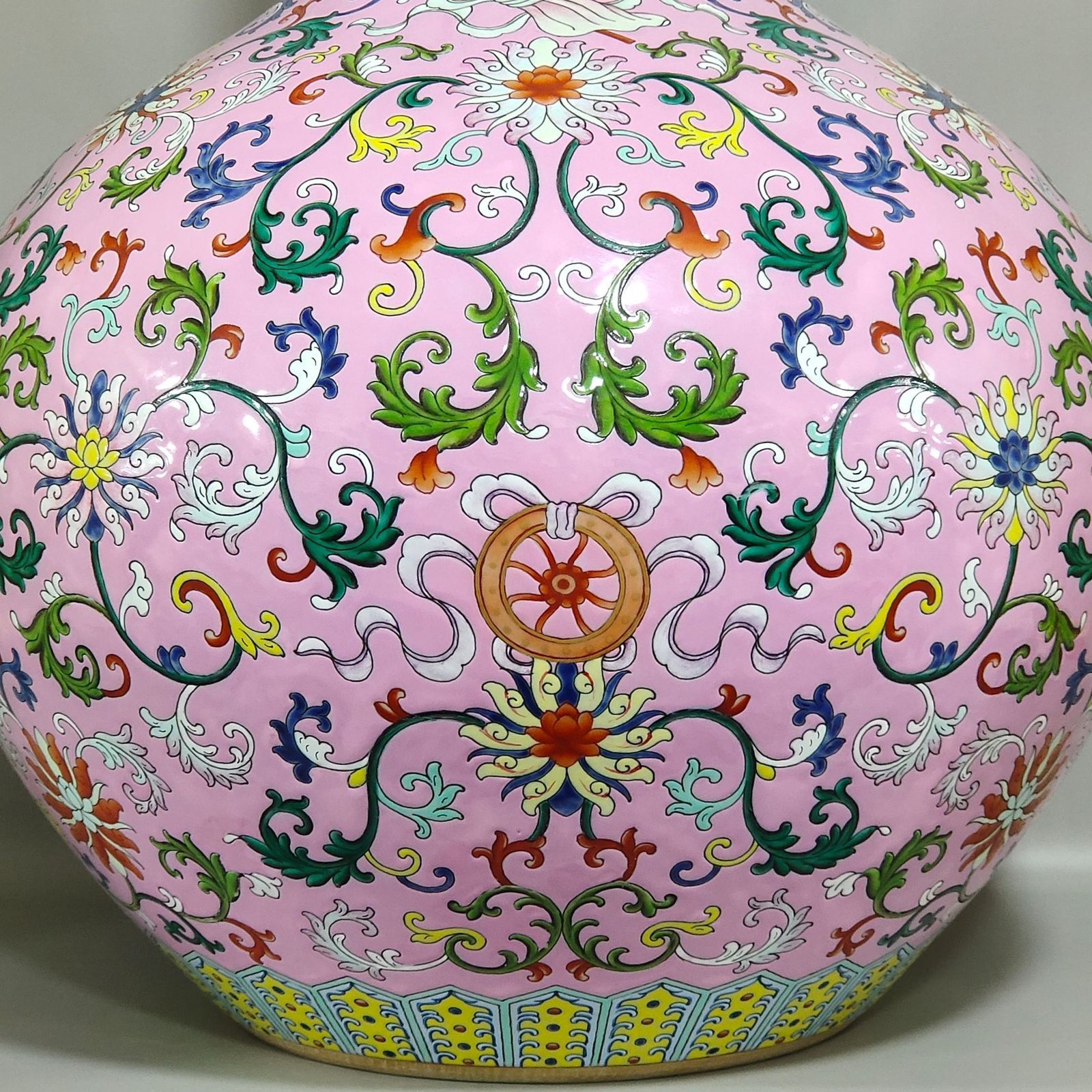 Qing Dynasty Qianlong powder ground with branches and eight treasures pattern vase