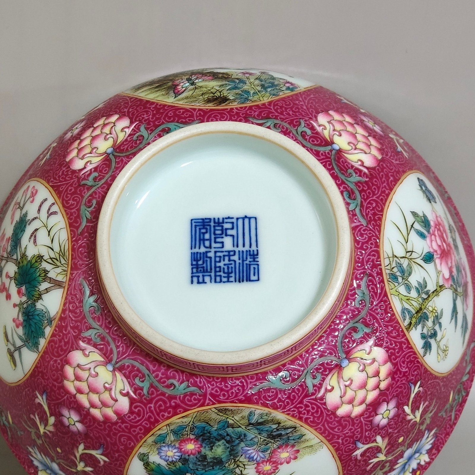 Qing Dynasty Qianlong rouge red window flower butterfly bowl