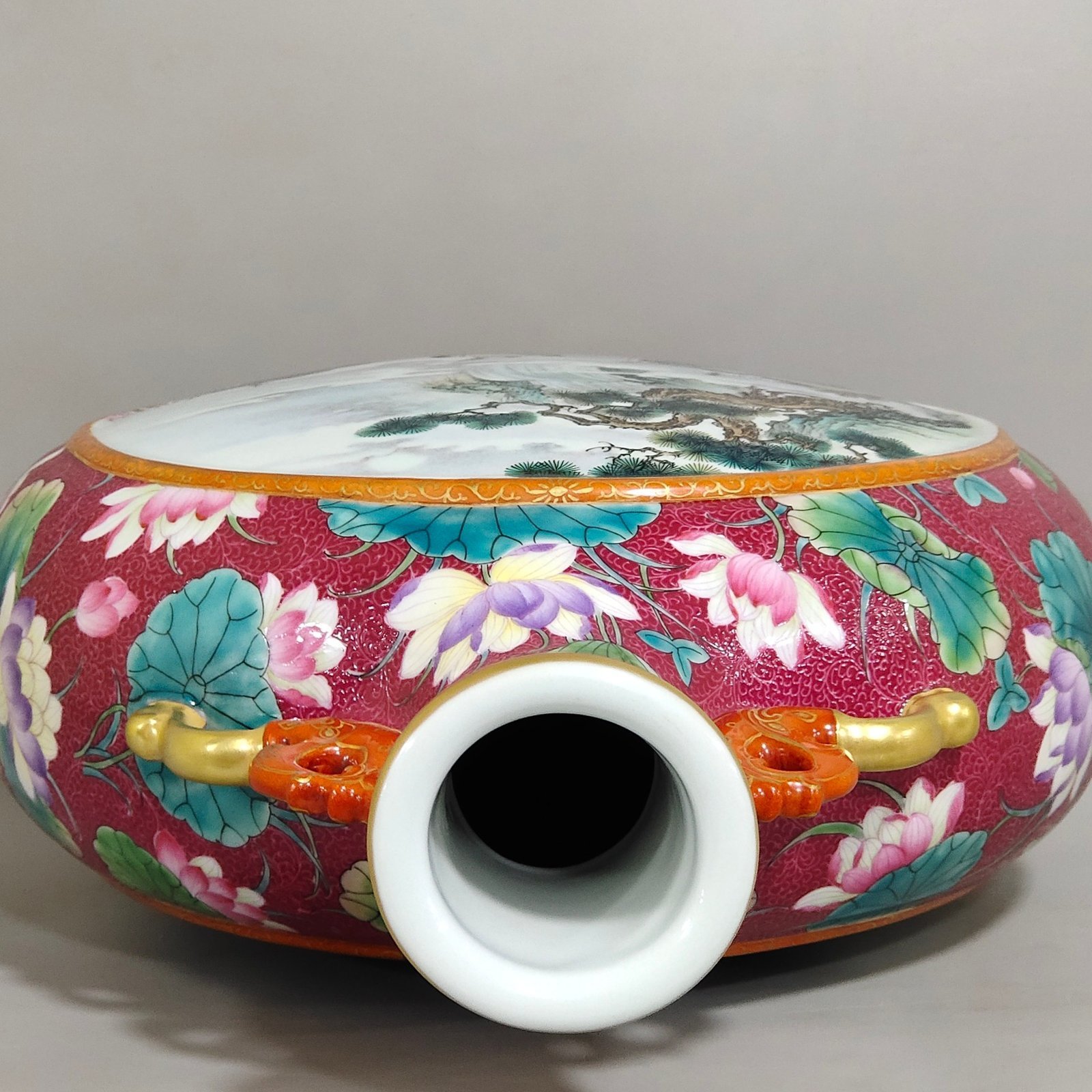 Qing Dynasty Qianlong rouge red grilled lotus window with pines and cranes holding the moon vase
