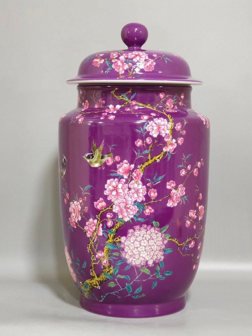 Qing Dynasty Qianlong eggplant skin glazed flower and bird lid jar