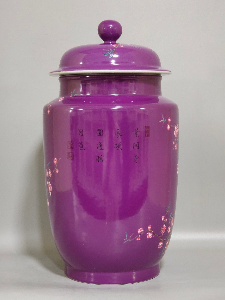 Qing Dynasty Qianlong eggplant skin glazed flower and bird lid jar
