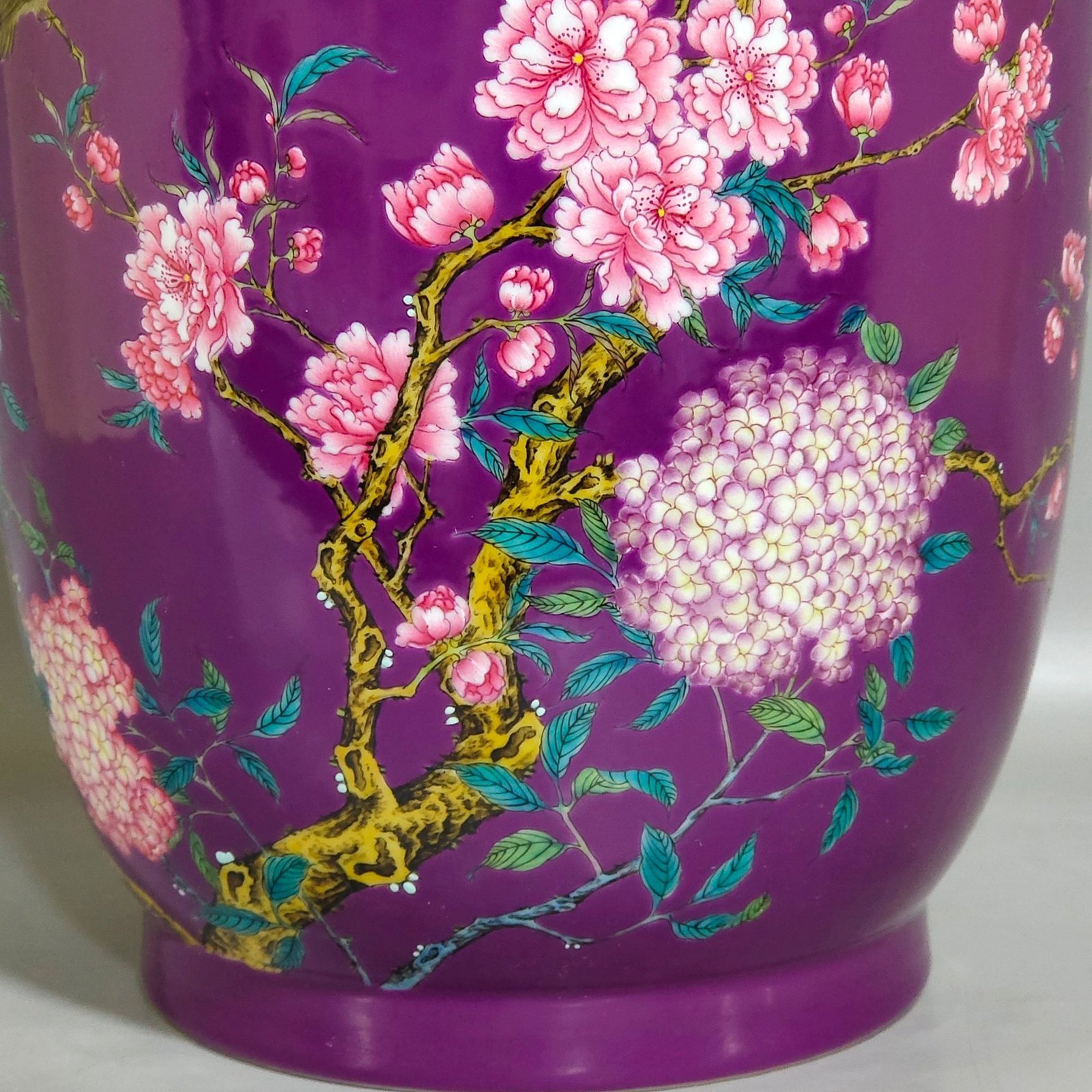Qing Dynasty Qianlong eggplant skin glazed flower and bird lid jar
