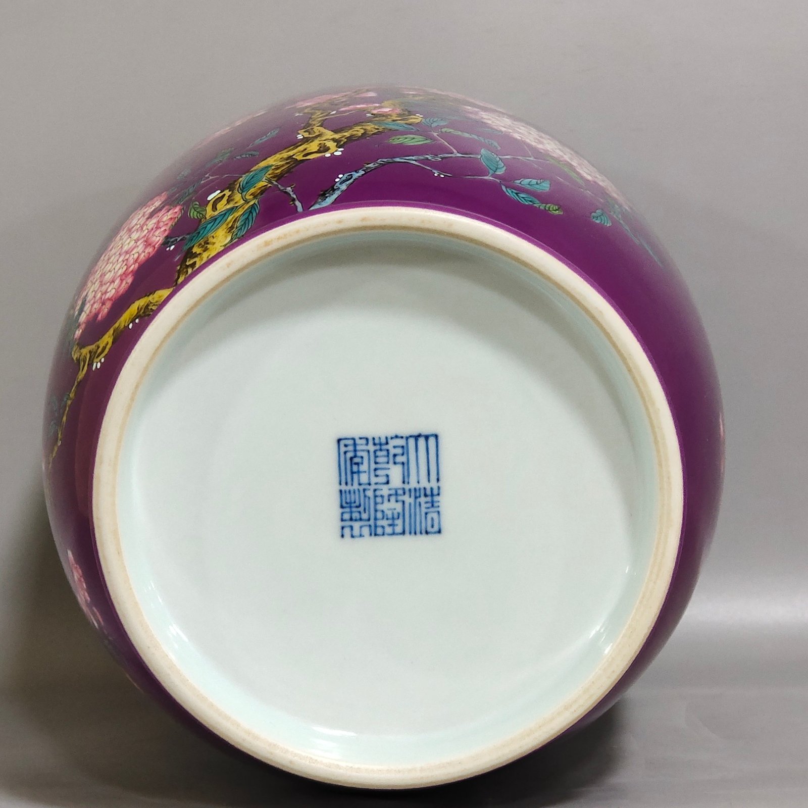 Qing Dynasty Qianlong eggplant skin glazed flower and bird lid jar