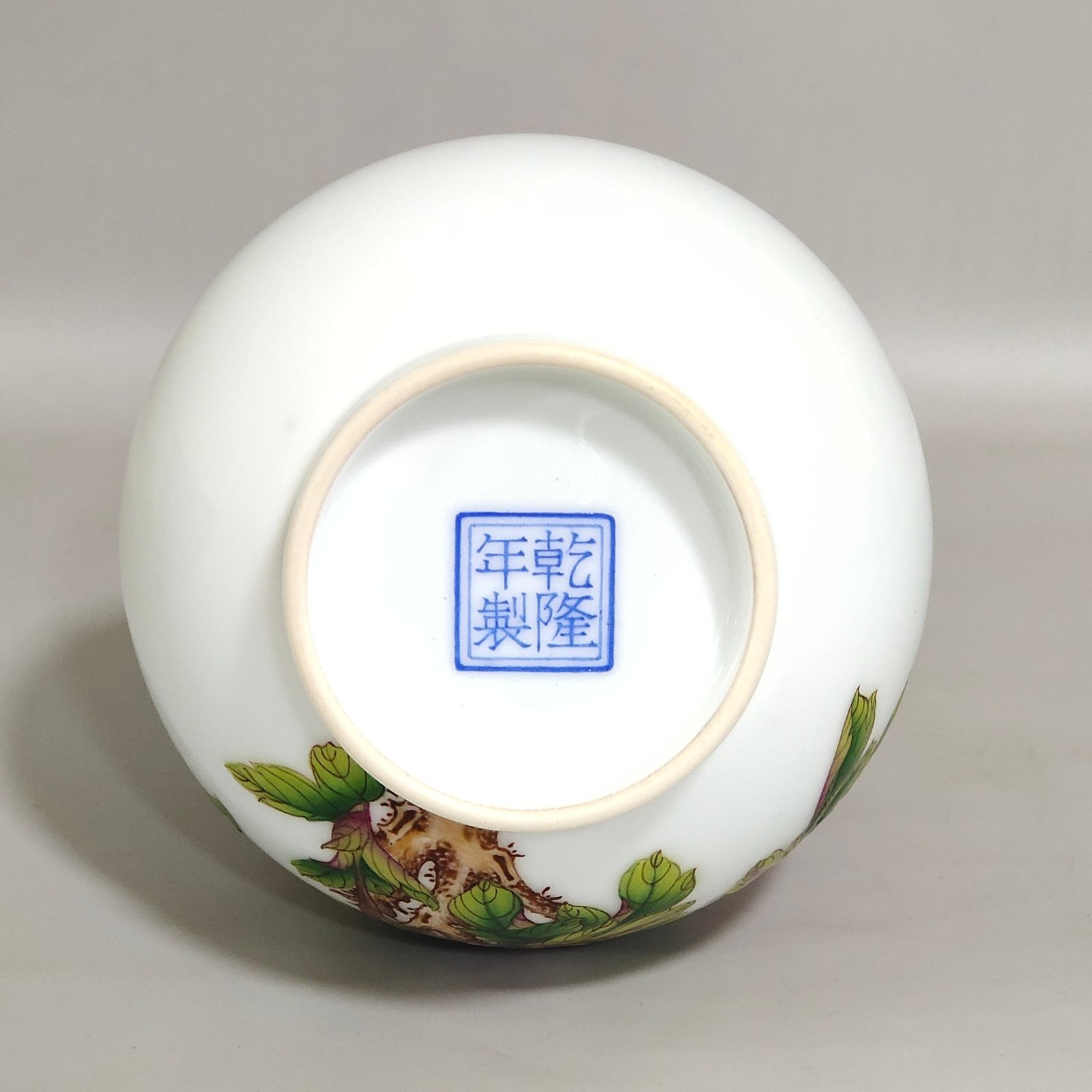 Qing Dynasty Qianlong Castiglione enamel floral double-eared jade spring vase