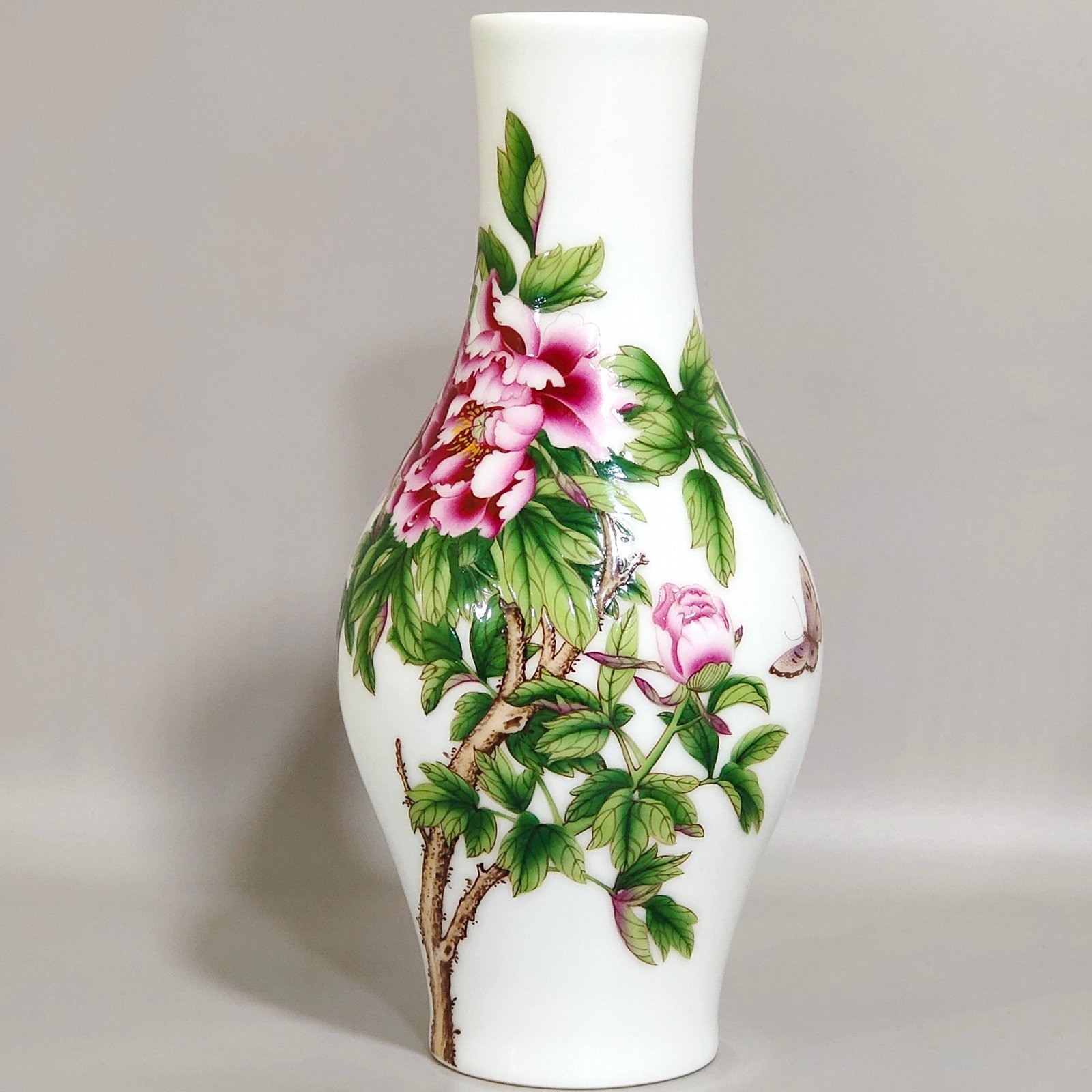 Qing Dynasty Qianlong Castiglione enamel flower-inscribed olive vase