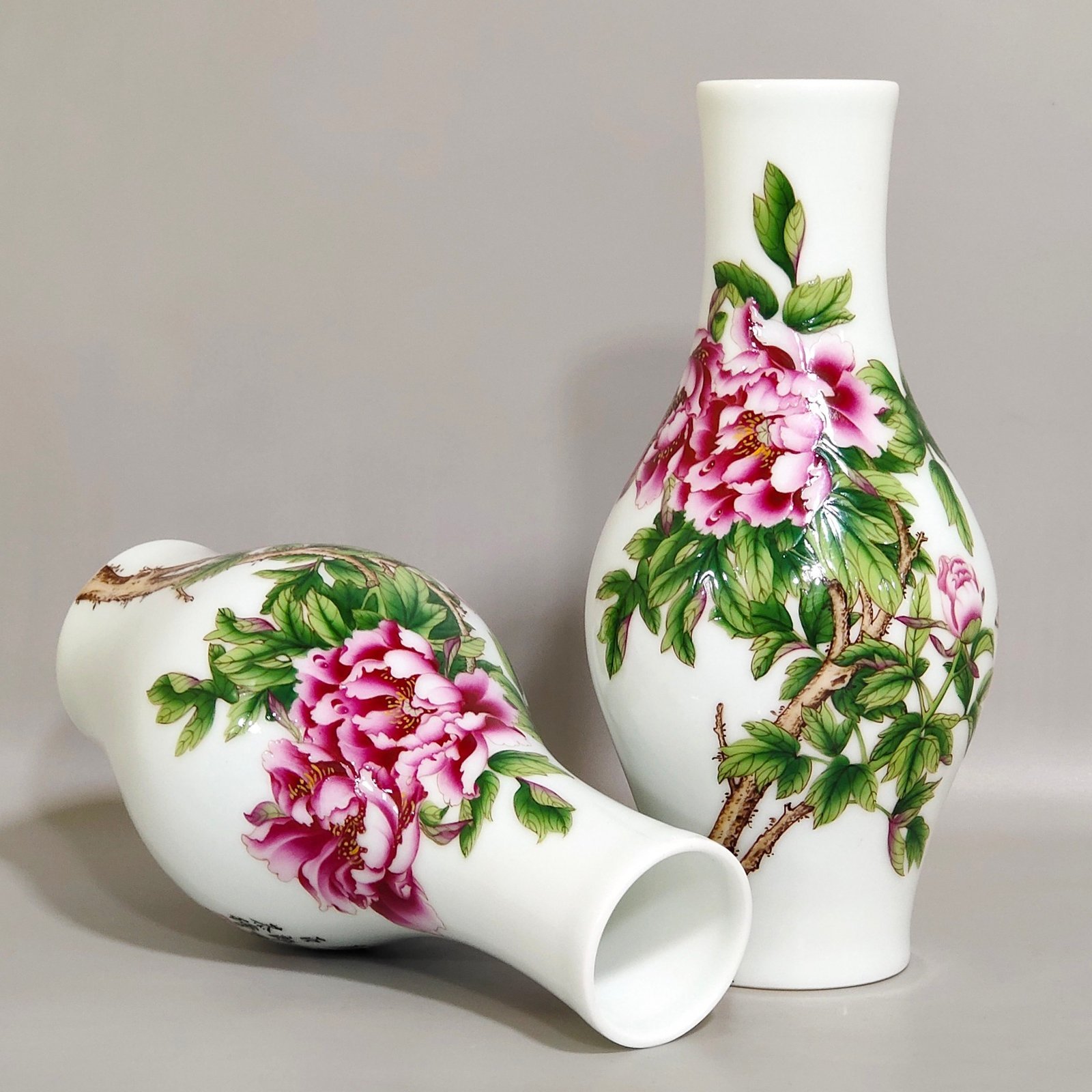 Qing Dynasty Qianlong Castiglione enamel flower-inscribed olive vase