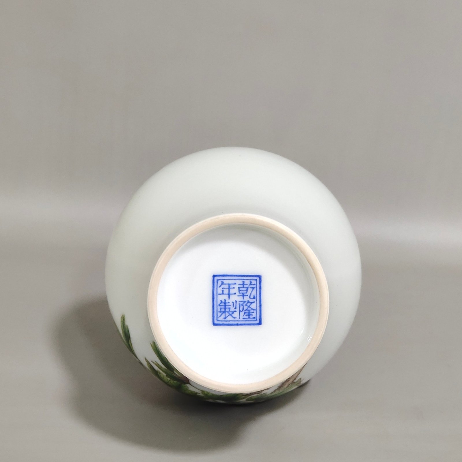 Qing Dynasty Qianlong Castiglione enamel flower-inscribed olive vase