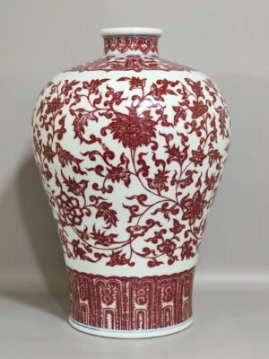 Qing Dynasty Qianlong underglaze red tangled branches and plum vase