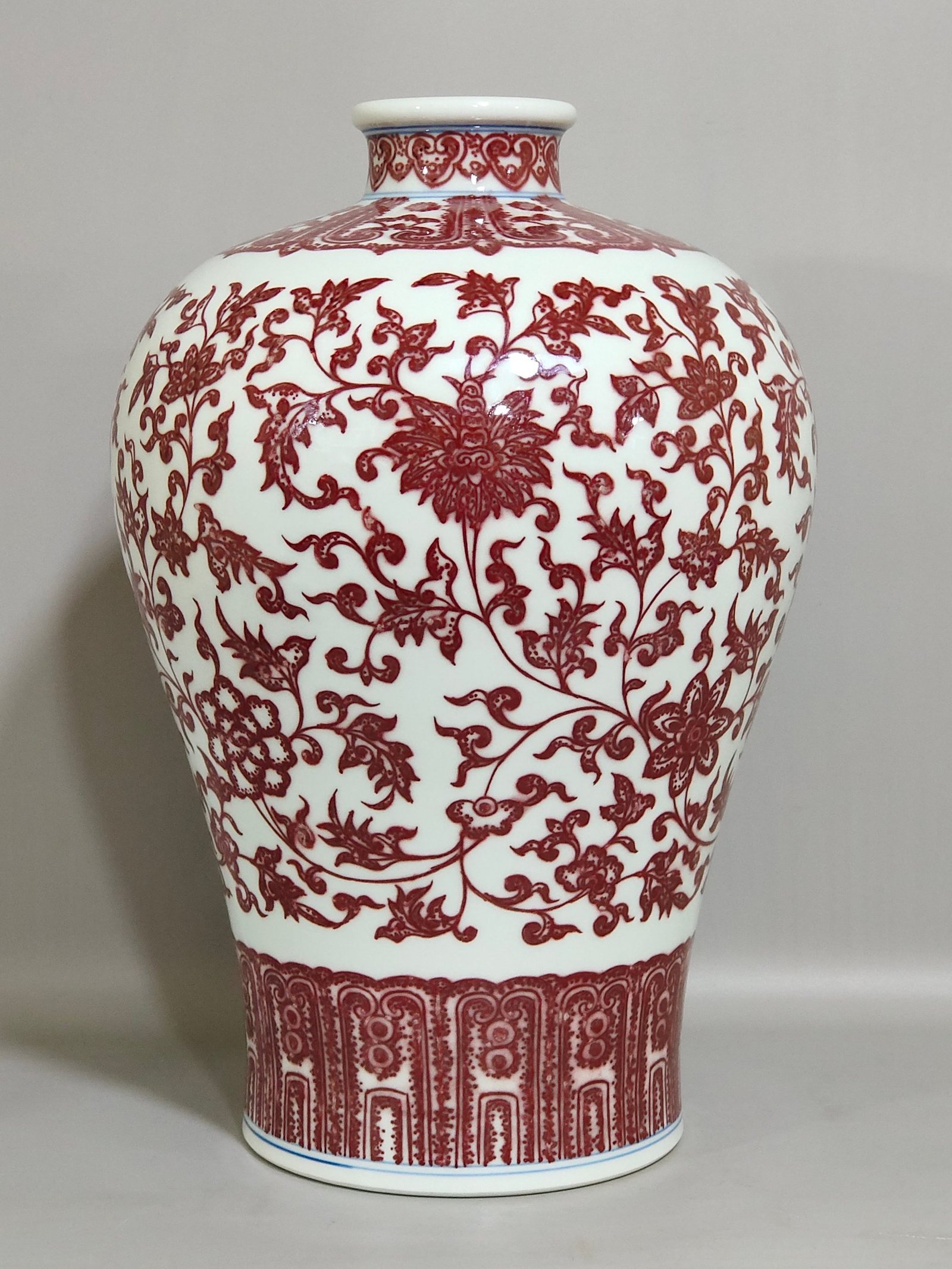 Qing Dynasty Qianlong underglaze red tangled branches and plum vase
