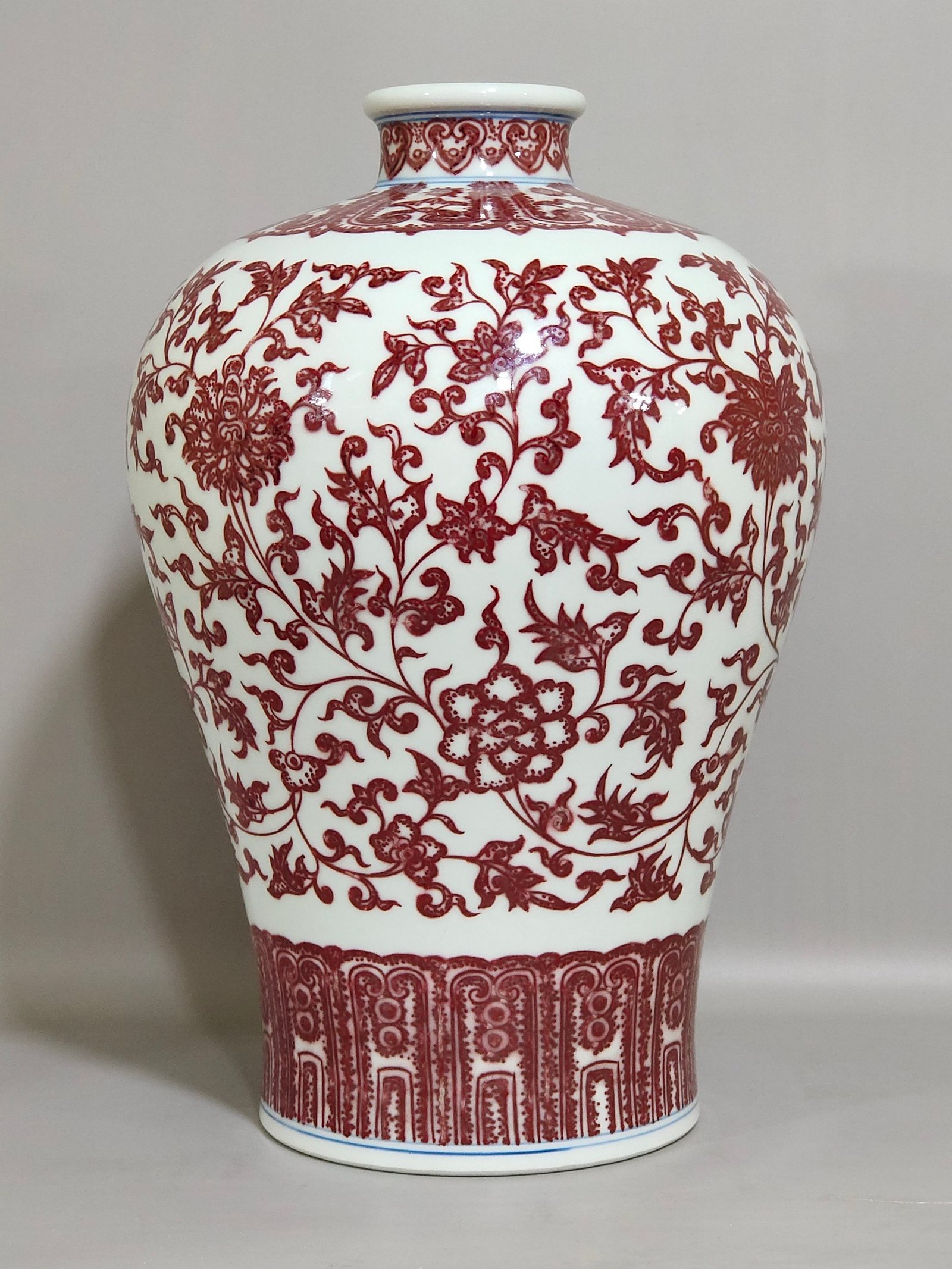 Qing Dynasty Qianlong underglaze red tangled branches and plum vase