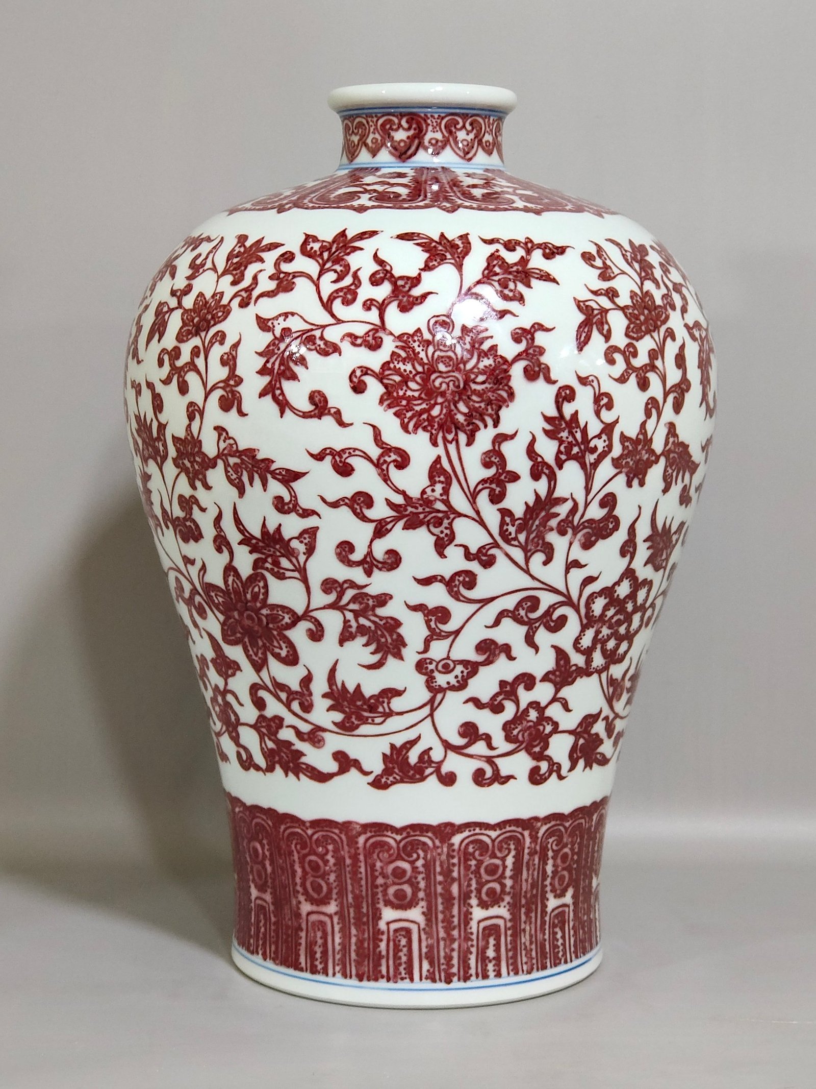 Qing Dynasty Qianlong underglaze red tangled branches and plum vase