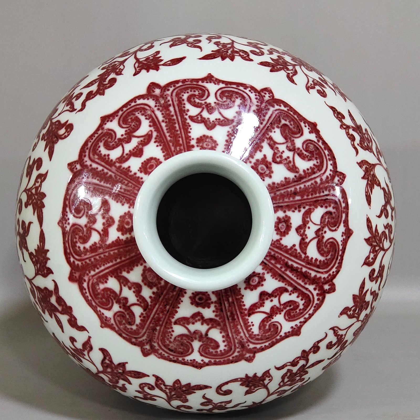 Qing Dynasty Qianlong underglaze red tangled branches and plum vase