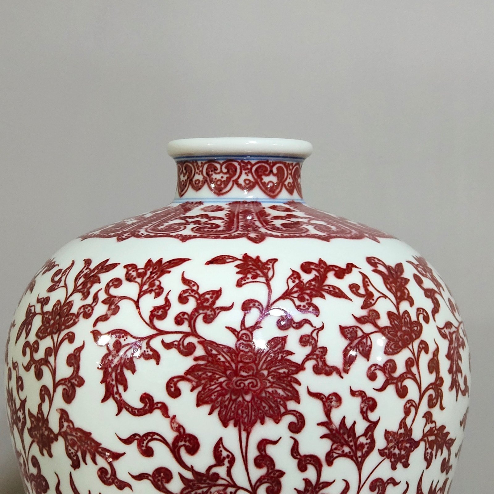 Qing Dynasty Qianlong underglaze red tangled branches and plum vase